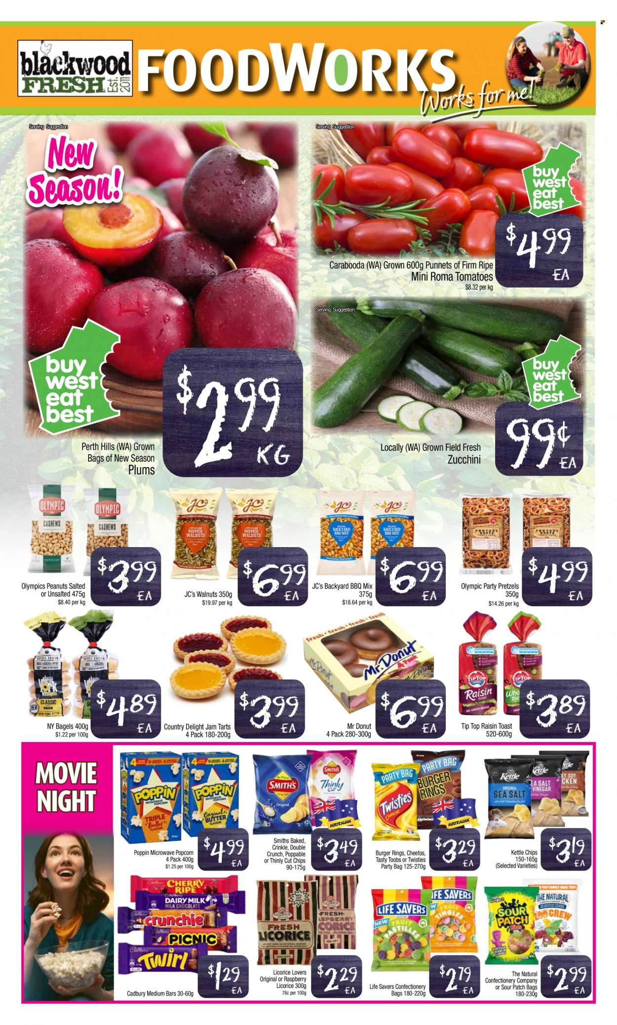 thumbnail - Foodworks Catalogue - 8 Feb 2023 - 14 Feb 2023 - Sales products - bagels, pretzels, Tip Top, donut, zucchini, tomatoes, plums, cherries, carp, hamburger, milk chocolate, chocolate, Cadbury, Dairy Milk, Sour Patch, Cheetos, Smith's, popcorn, fruit jam, cashews, walnuts, peanuts, Hill's. Page 3.