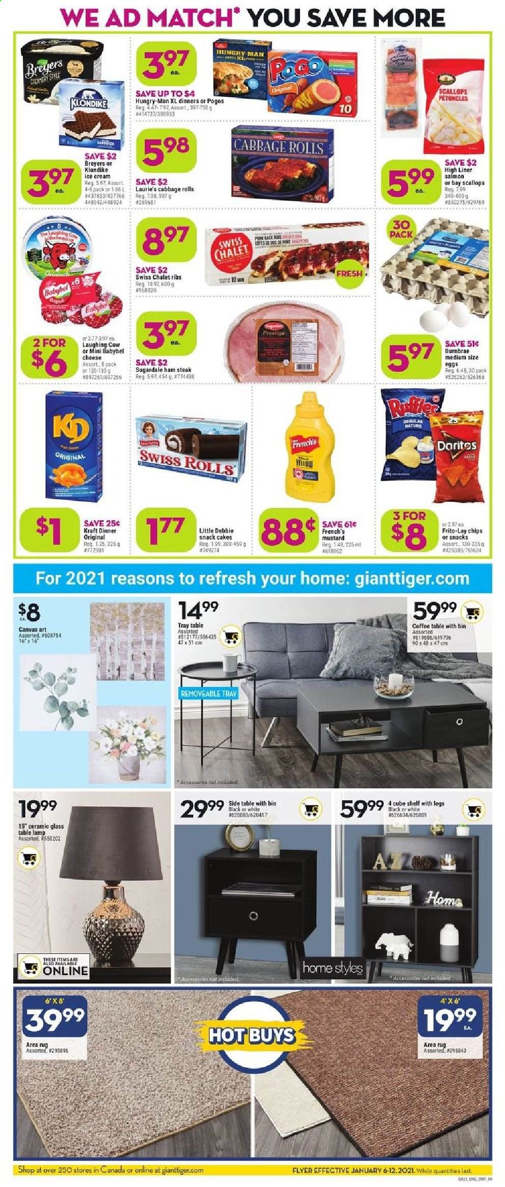 thumbnail - Giant Tiger Flyer - January 06, 2021 - January 12, 2021 - Sales products - cake, cabbage, salmon, scallops, Kraft®, Sugardale, ham, ham steaks, cheese, The Laughing Cow, Babybel, eggs, ice cream, Doritos, Frito-Lay, mustard, bin, canvas, coffee table, sidetable, lamp, table lamp, rug, area rug, chips, steak. Page 2.