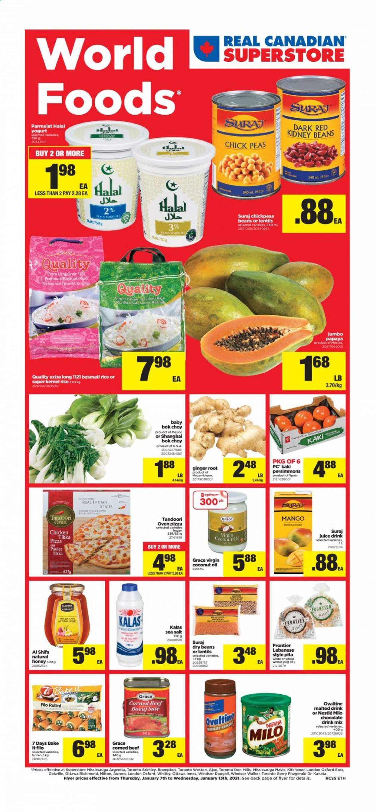 thumbnail - Real Canadian Superstore Flyer - January 07, 2021 - January 13, 2021 - Sales products - pita, beans, bok choy, ginger, peas, papaya, persimmons, pizza, corned beef, yoghurt, Parmalat, Milo, filo dough, chocolate, 7 Days, sea salt, lentils, kidney beans, basmati rice, chickpeas, dry beans, coconut oil, oil, honey, juice, beef meat, Ajax, Optimum, Nestlé. Page 1.