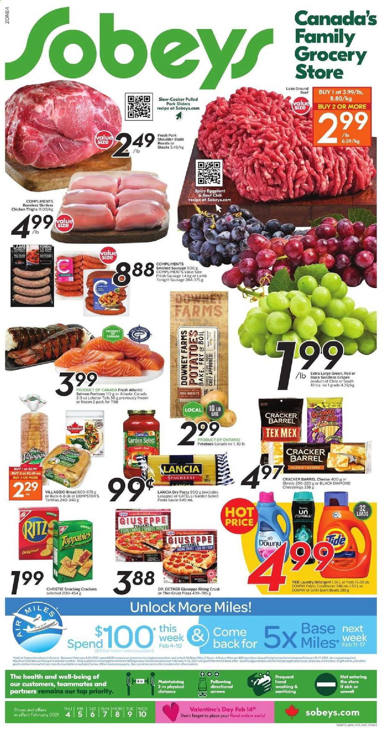 thumbnail - Sobeys Flyer - February 04, 2021 - February 10, 2021 - Sales products - bread, tortillas, buns, potatoes, eggplant, grapes, seedless grapes, spaghetti, pizza, pasta sauce, sauce, pulled pork, sausage, smoked sausage, string cheese, Dr. Oetker, crackers, RITZ, L'Or, chicken thighs, chicken, beef meat, ground beef, pork meat, pork shoulder, Gain, Tide, laundry detergent, Downy Laundry, steak. Page 1.