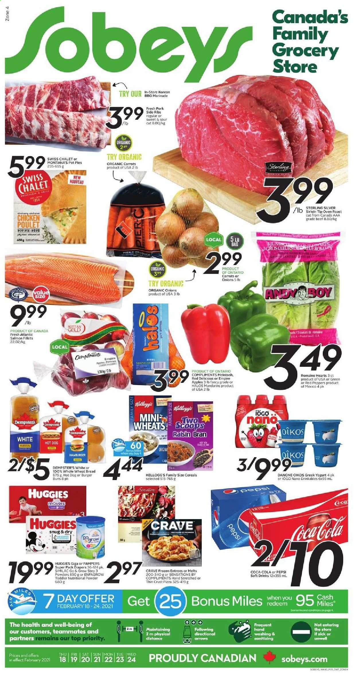 thumbnail - Sobeys Flyer - February 18, 2021 - February 24, 2021 - Sales products - wheat bread, pie, buns, burger buns, pot pie, carrots, onion, peppers, red peppers, apples, mandarines, Red Delicious apples, salmon, salmon fillet, hot dog, pizza, greek yoghurt, yoghurt, Oikos, Kellogg's, Raisin Bran, marinade, Coca-Cola, Pepsi, soft drink, Similac, nappies, Danone, Huggies, Pampers. Page 1.