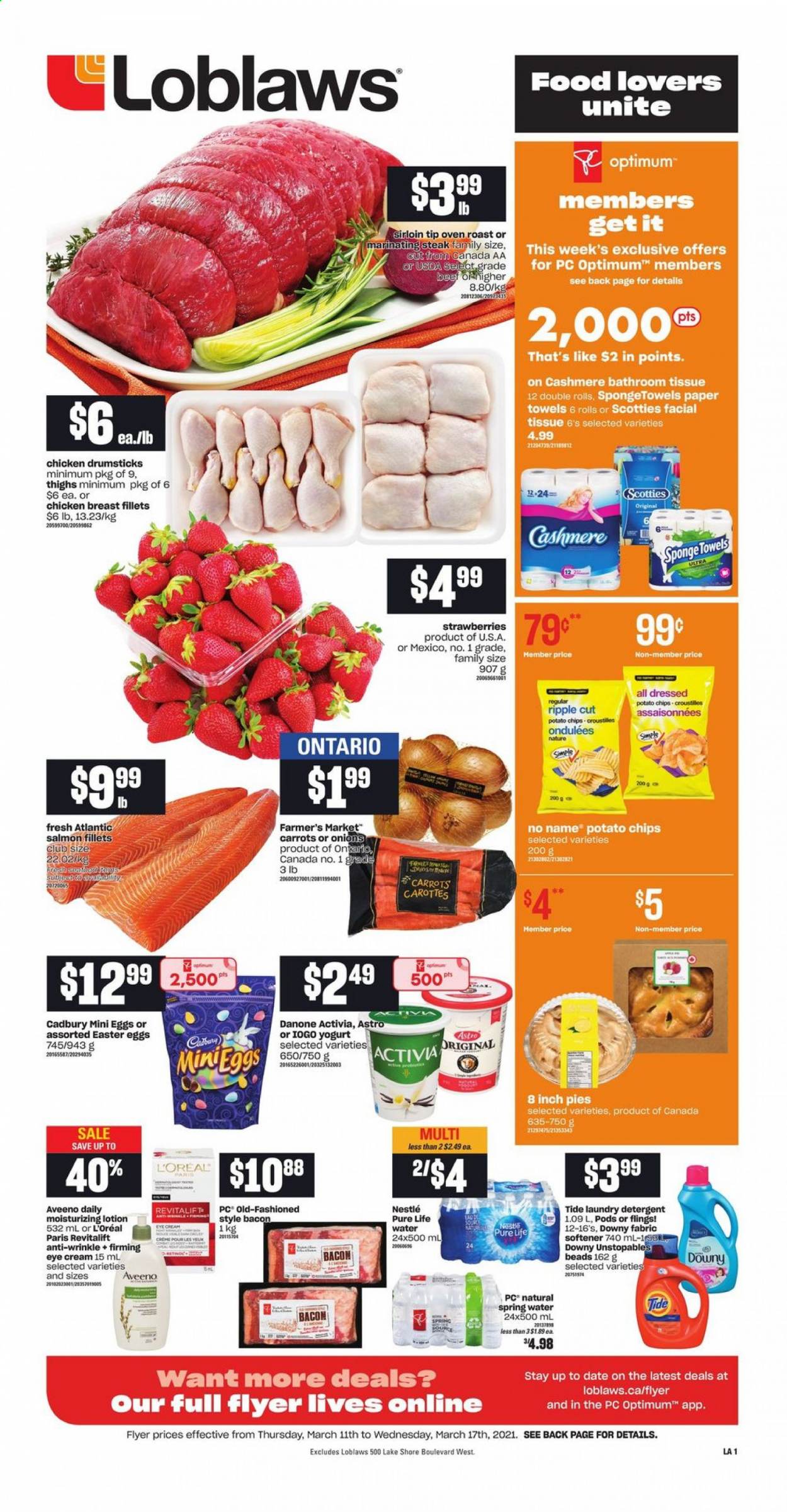 thumbnail - Loblaws Flyer - March 11, 2021 - March 17, 2021 - Sales products - carrots, onion, strawberries, salmon, salmon fillet, No Name, bacon, yoghurt, Activia, Cadbury, potato chips, spring water, Pure Life Water, chicken breasts, chicken drumsticks, chicken, Aveeno, bath tissue, kitchen towels, paper towels, Tide, Unstopables, fabric softener, laundry detergent, Downy Laundry, L’Oréal, eye cream, body lotion, Optimum, Danone, Nestlé, chips, steak. Page 1.