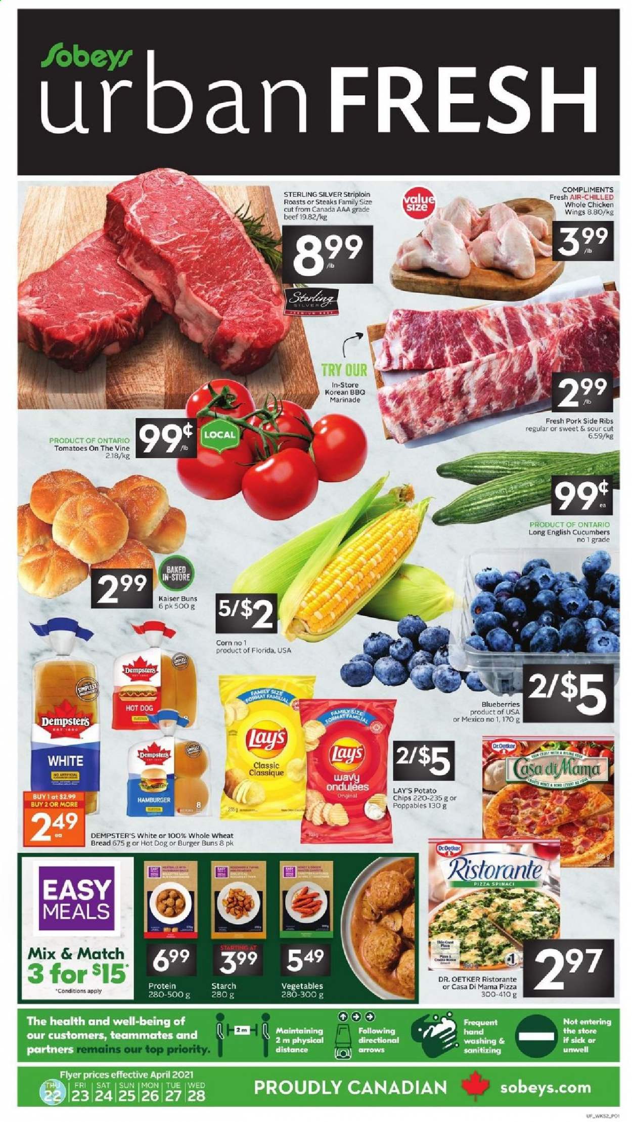thumbnail - Sobeys Urban Fresh Flyer - April 22, 2021 - April 28, 2021 - Sales products - wheat bread, buns, burger buns, corn, cucumber, blueberries, hot dog, pizza, Dr. Oetker, chicken wings, Lay’s, starch, marinade, whole chicken, chicken, chips, steak. Page 1.