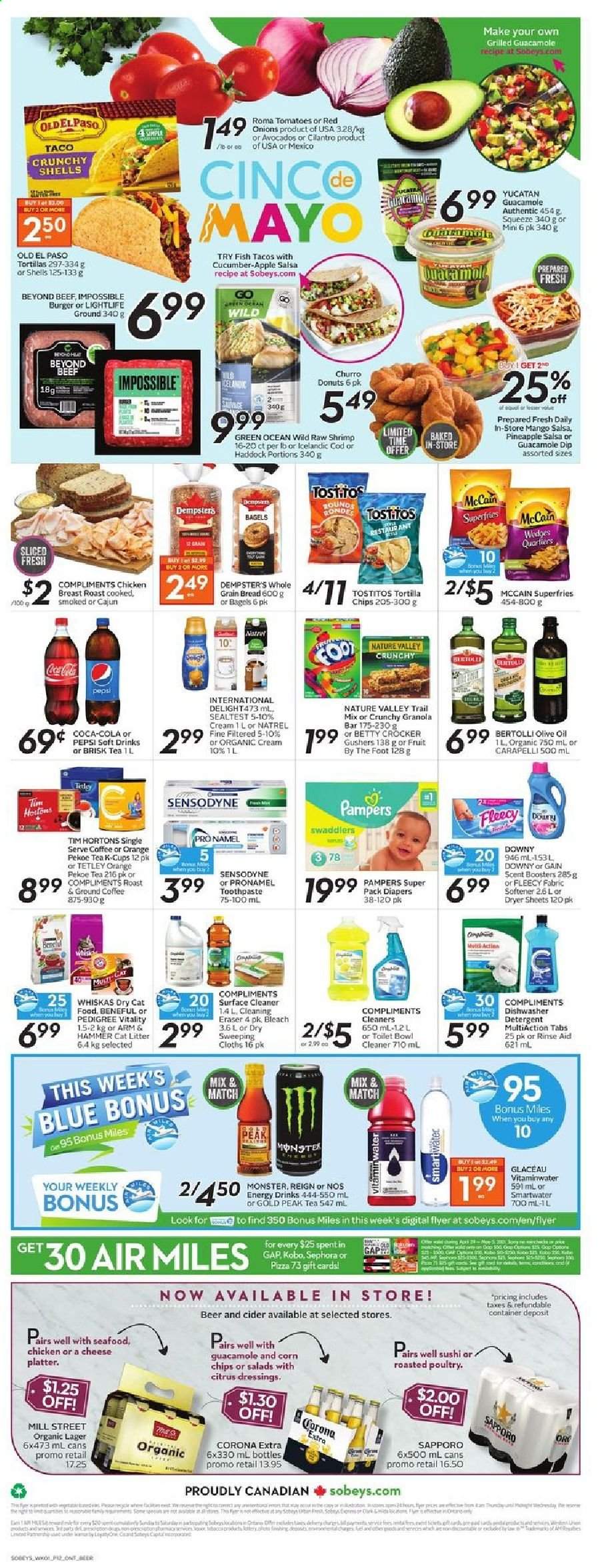 thumbnail - Sobeys Flyer - April 29, 2021 - May 05, 2021 - Sales products - bagels, bread, Old El Paso, tacos, donut, red onions, onion, pineapple, cod, haddock, fish, shrimps, pizza, hamburger, Bertolli, guacamole, mayonnaise, McCain, potato fries, tortilla chips, corn chips, Tostitos, ARM & HAMMER, granola bar, Nature Valley, cilantro, salsa, olive oil, oil, trail mix, Coca-Cola, Pepsi, energy drink, Monster, soft drink, Gold Peak Tea, Smartwater, tea, coffee, ground coffee, coffee capsules, L'Or, K-Cups, cider, beer, Corona Extra, Lager, chicken breasts, chicken, nappies, surface cleaner, cleaner, bleach, fabric softener, dryer sheets, scent booster, toothpaste, cat litter, animal food, cat food, Pedigree, dry cat food, granola, Pampers, chips, Sensodyne. Page 12.