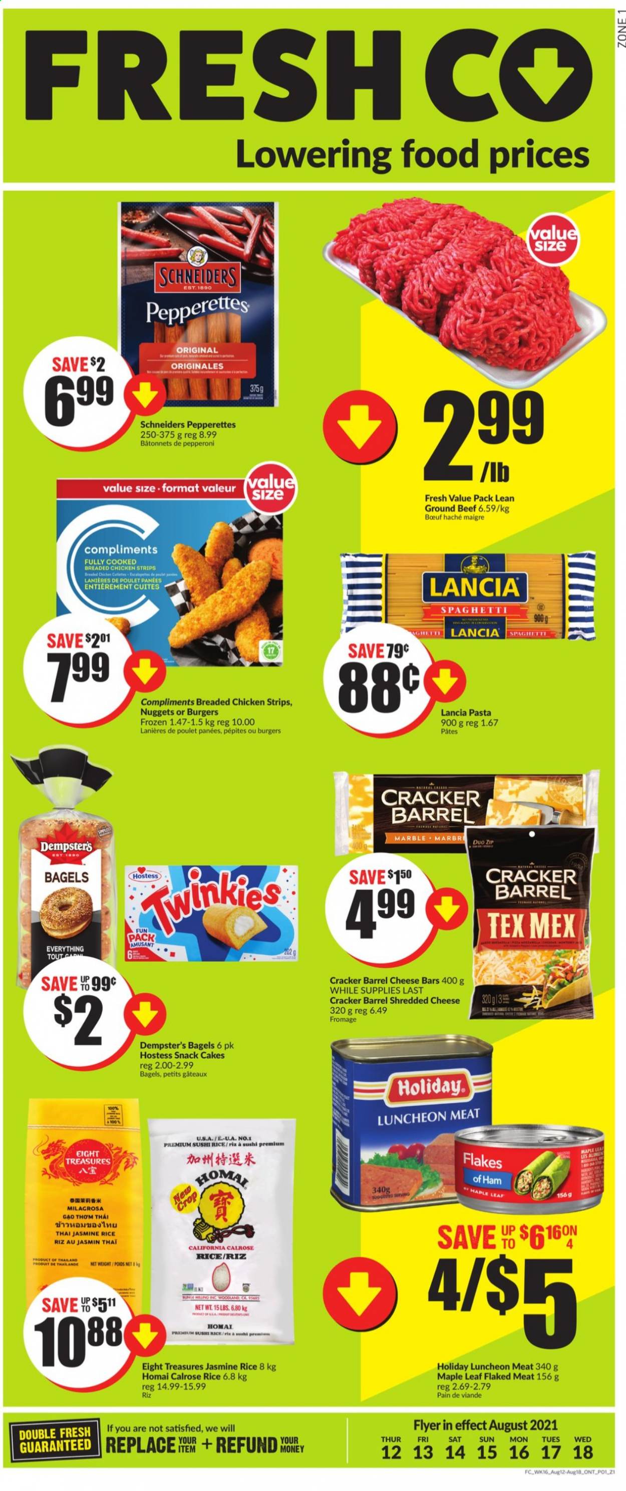thumbnail - FreshCo. Flyer - August 12, 2021 - August 18, 2021 - Sales products - bagels, cake, spaghetti, nuggets, pasta, fried chicken, ham, pepperoni, lunch meat, shredded cheese, strips, chicken strips, snack, crackers, rice, jasmine rice, beef meat, ground beef. Page 1.