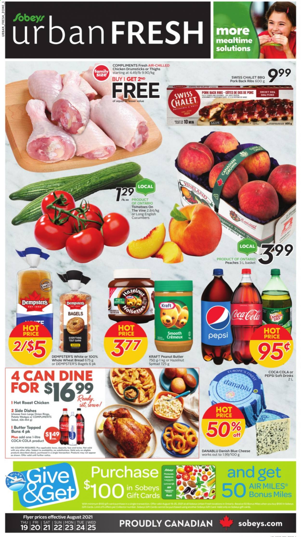 thumbnail - Sobeys Urban Fresh Flyer - August 19, 2021 - August 25, 2021 - Sales products - bagels, wheat bread, buns, cucumber, tomatoes, peaches, chicken roast, onion rings, Kraft®, blue cheese, cheese, potato wedges, peanut butter, hazelnut spread, Canada Dry, Coca-Cola, Pepsi, soft drink, chicken drumsticks, chicken, pork meat, pork ribs, pork back ribs. Page 1.