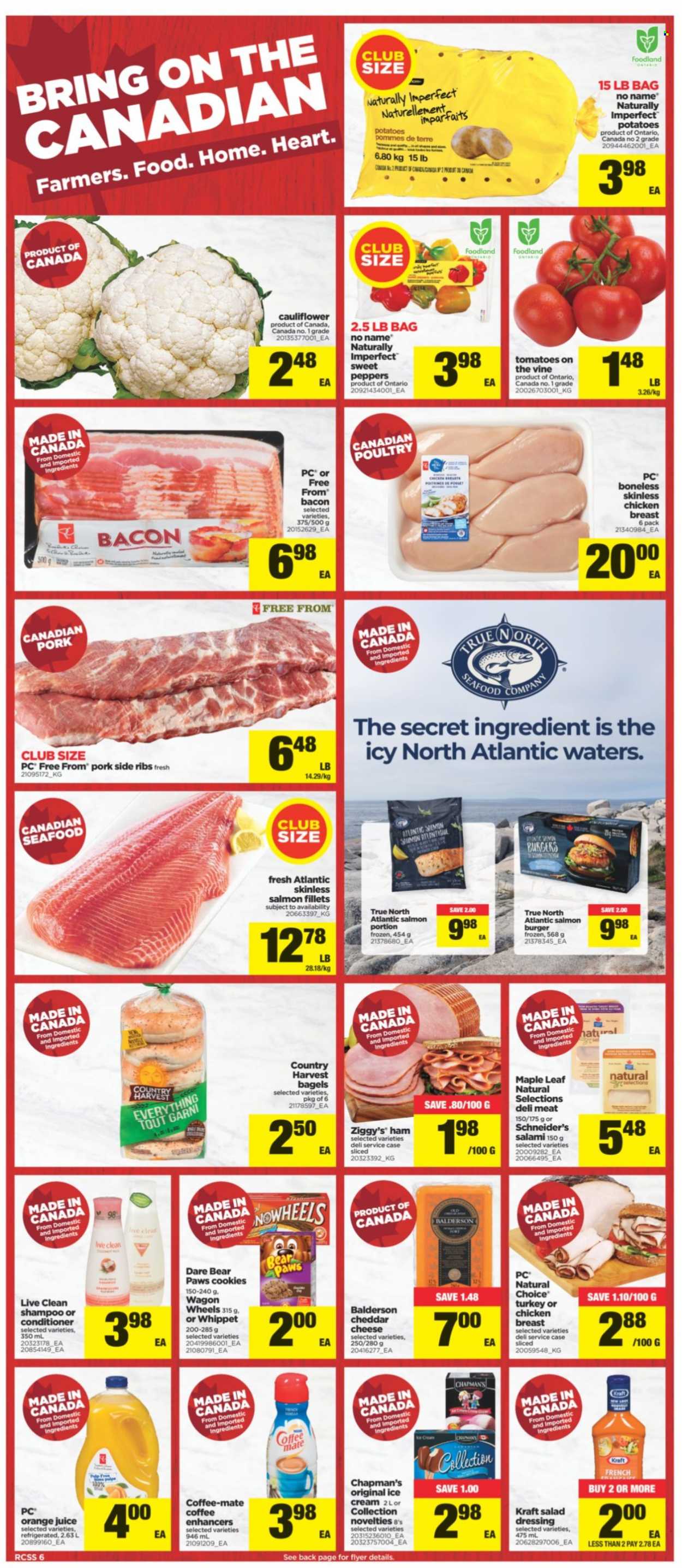 thumbnail - Real Canadian Superstore Flyer - September 23, 2021 - September 29, 2021 - Sales products - bagels, cauliflower, sweet peppers, tomatoes, potatoes, salmon, salmon fillet, seafood, No Name, hamburger, Kraft®, salami, ham, cheddar, Coffee-Mate, Country Harvest, cookies, dressing, orange juice, juice, chicken breasts, chicken, conditioner, Paws, wagon, shampoo. Page 6.