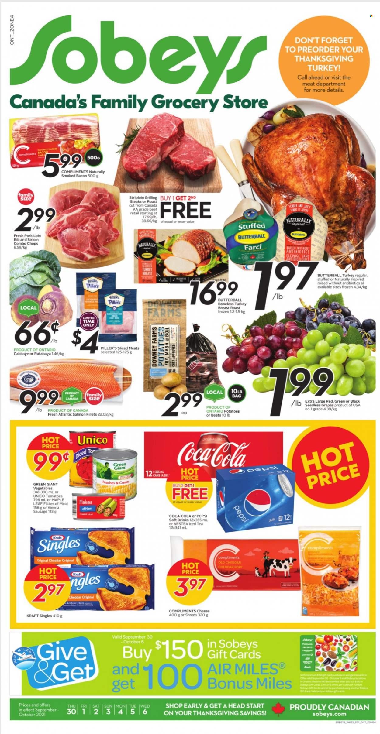 thumbnail - Sobeys Flyer - September 30, 2021 - October 06, 2021 - Sales products - tomatoes, potatoes, grapes, seedless grapes, peaches, salmon, salmon fillet, Kraft®, bacon, Butterball, ham, sausage, vienna sausage, sandwich slices, cheddar, cheese, Kraft Singles, Coca-Cola, Pepsi, ice tea, soft drink, turkey breast, turkey, pork loin, pork meat, Gain, rutabaga, steak. Page 1.