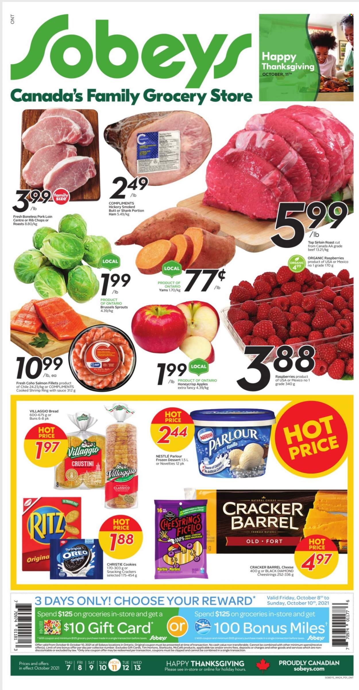 thumbnail - Sobeys Flyer - October 07, 2021 - October 13, 2021 - Sales products - bread, buns, brussel sprouts, apples, salmon, salmon fillet, shrimps, ham, string cheese, cheese, cookies, crackers, RITZ, Classico, Starbucks, McCafe, pork loin, pork meat, rib chops, nappies, Oreo, Nestlé. Page 1.