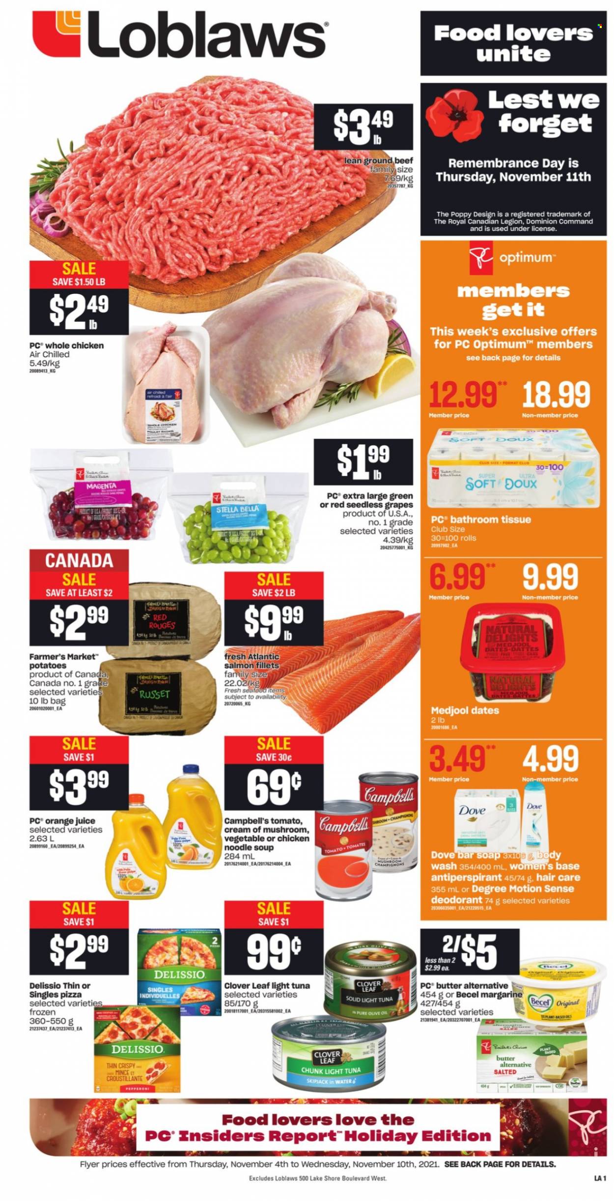 thumbnail - Loblaws Flyer - November 04, 2021 - November 10, 2021 - Sales products - Bella, russet potatoes, potatoes, grapes, seedless grapes, salmon, salmon fillet, tuna, seafood, Campbell's, pizza, soup, noodles cup, noodles, pepperoni, Clover, butter, margarine, light tuna, olive oil, oil, dried dates, orange juice, juice, whole chicken, chicken, beef meat, ground beef, bath tissue, body wash, soap bar, soap, anti-perspirant, Optimum, Dove, deodorant. Page 1.