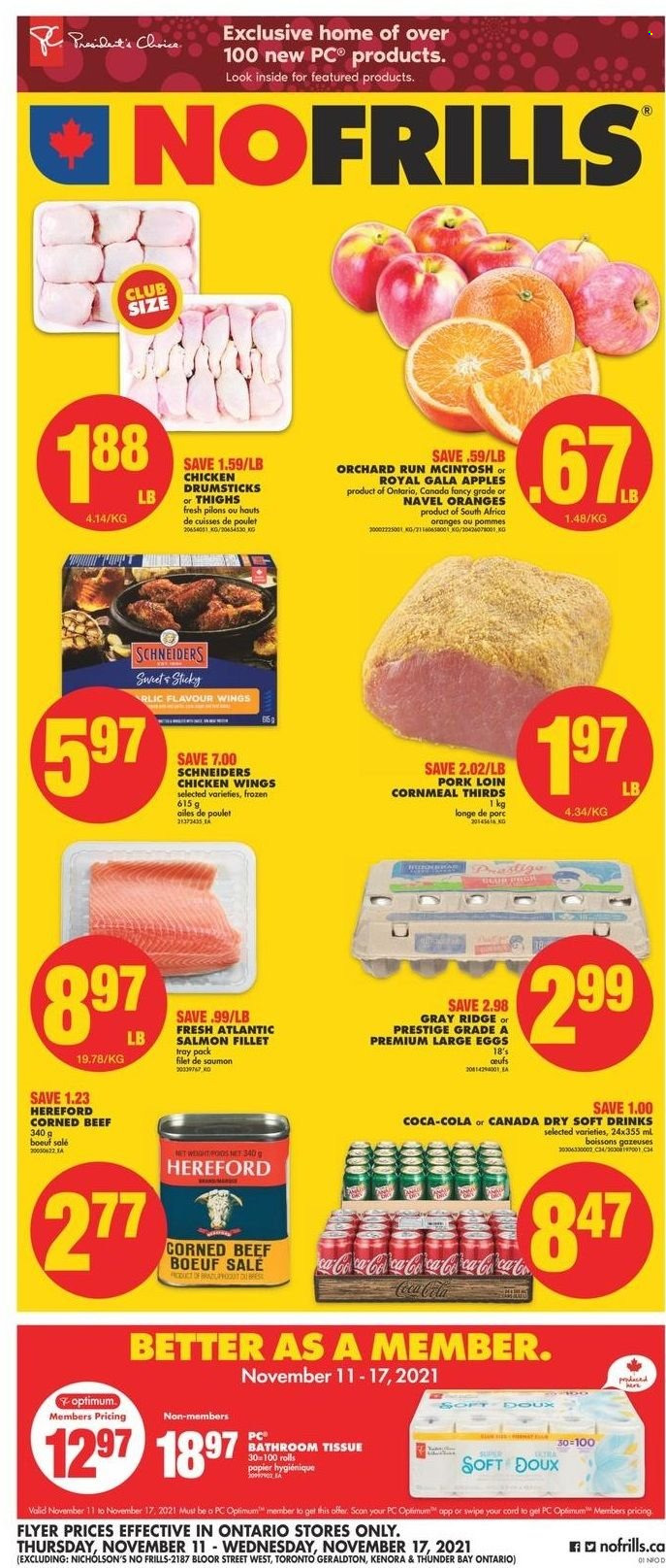 thumbnail - No Frills Flyer - November 11, 2021 - November 17, 2021 - Sales products - apples, Gala, navel oranges, salmon, salmon fillet, corned beef, large eggs, chicken wings, Canada Dry, Coca-Cola, soft drink, chicken drumsticks, chicken, beef meat, pork loin, pork meat, bath tissue, Optimum, McIntosh, oranges. Page 1.