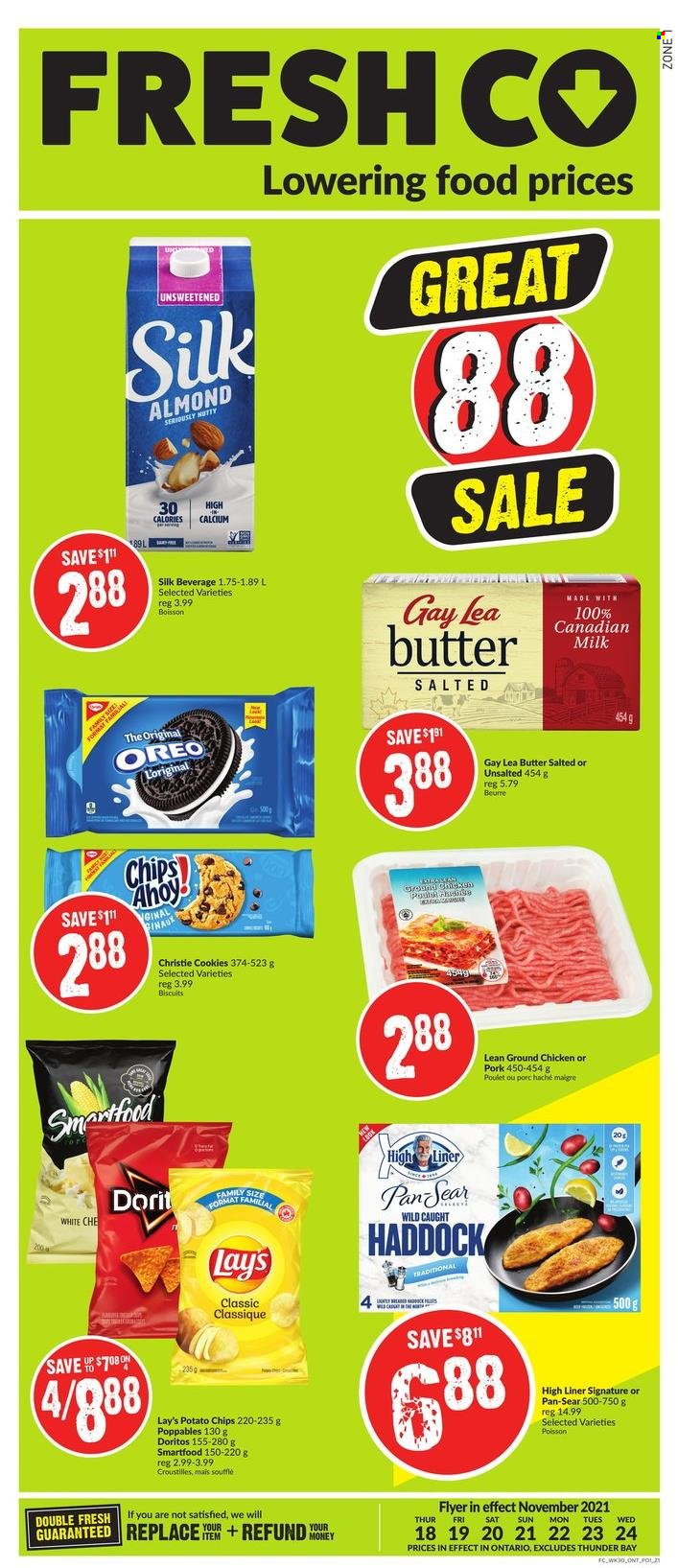 thumbnail - FreshCo. Flyer - November 18, 2021 - November 24, 2021 - Sales products - haddock, milk, Silk, butter, cookies, biscuit, Doritos, potato chips, Lay’s, Smartfood, ground chicken, chicken, Oreo, calcium, chips. Page 1.