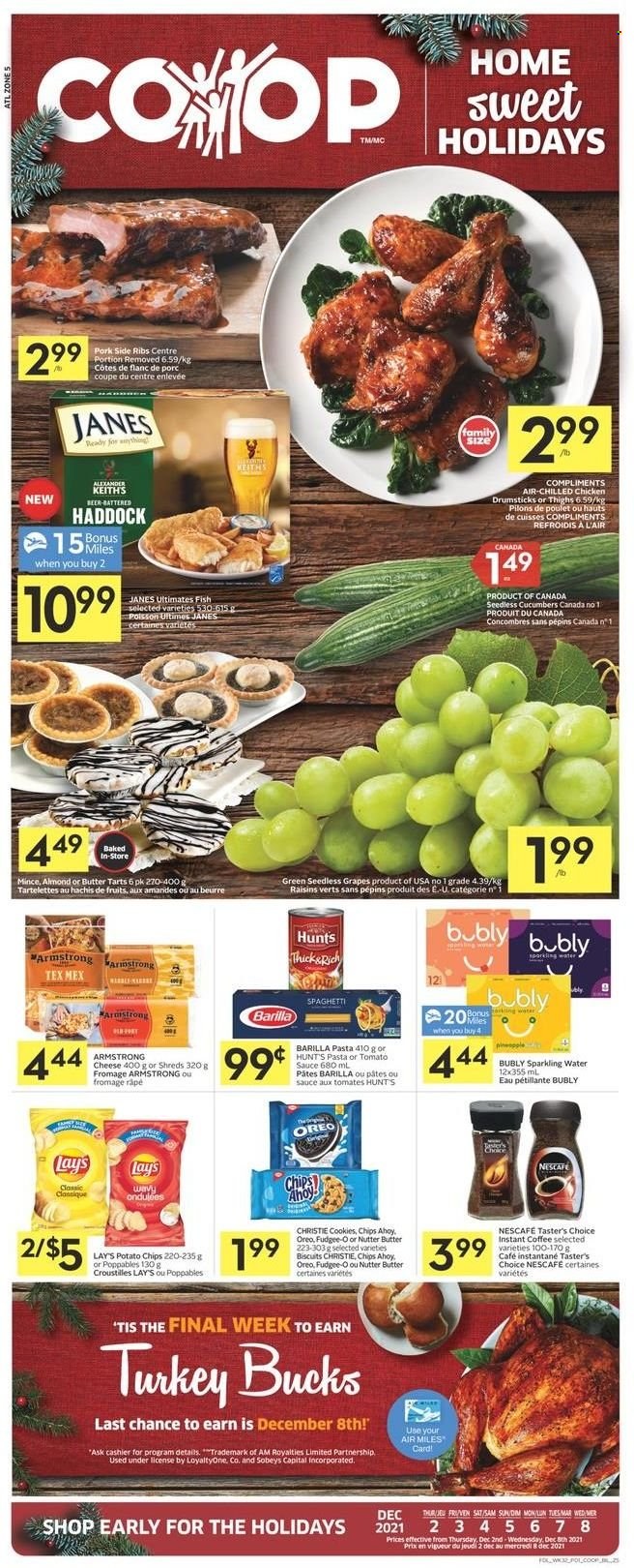 thumbnail - Co-op Flyer - December 02, 2021 - December 08, 2021 - Sales products - cucumber, grapes, seedless grapes, haddock, fish, spaghetti, sauce, Barilla, cheese, butter, cookies, biscuit, potato chips, Lay’s, tomato sauce, dried fruit, sparkling water, chicken drumsticks, chicken, Oreo, raisins, chips, Nescafé. Page 1.