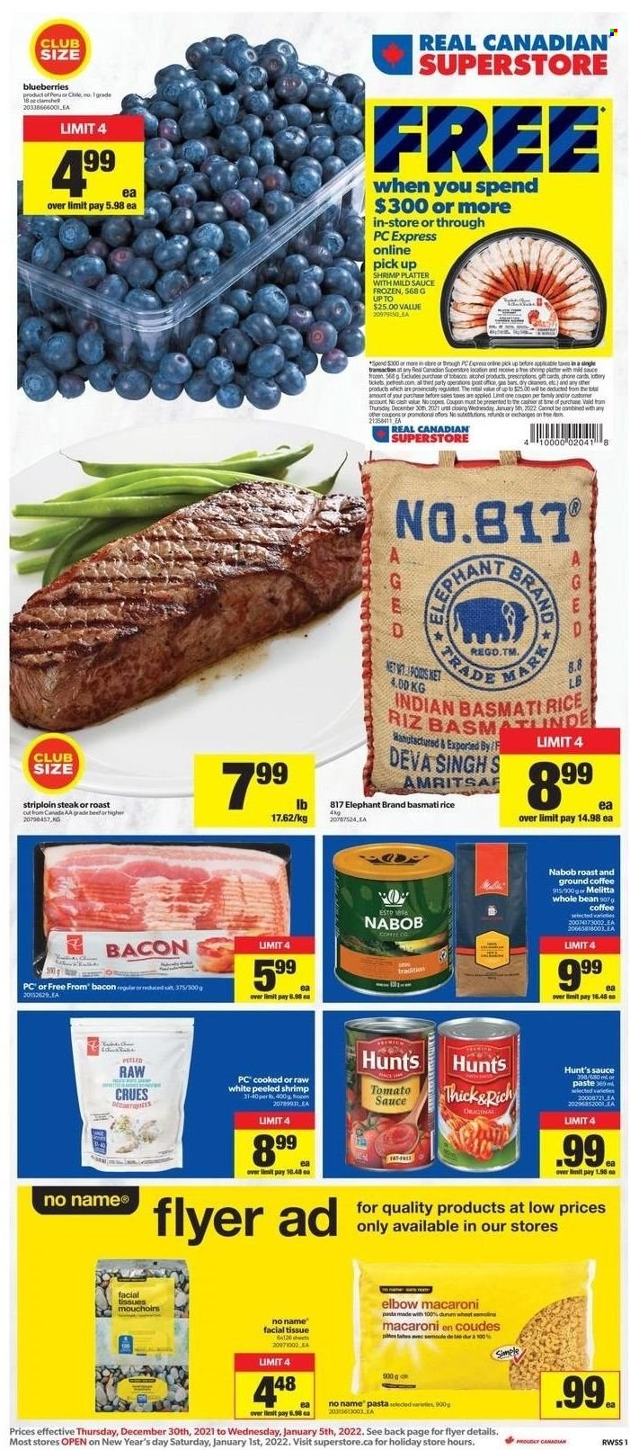 Real Canadian Superstore Flyer - December 30, 2021 - January 05, 2022 - Sales products - blueberries, No Name, macaroni, pasta, sauce, bacon, tomato sauce, basmati rice, rice, coffee, ground coffee, beef meat, striploin steak, tissues, facial tissues, platter, phone, steak. Page 1.