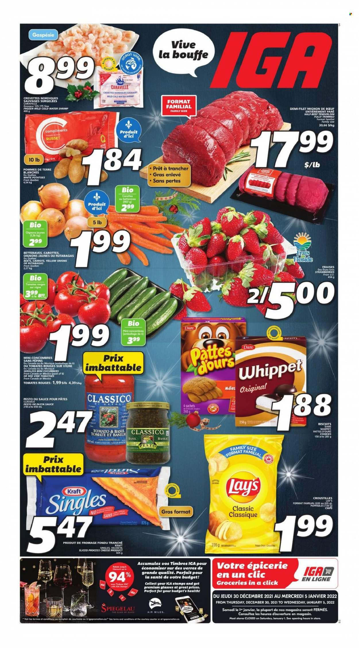 thumbnail - IGA Flyer - December 30, 2021 - January 05, 2022 - Sales products - cucumber, russet potatoes, potatoes, onion, strawberries, shrimps, pasta sauce, sauce, Kraft®, sandwich slices, cheese, Kraft Singles, cookies, biscuit, Lay’s, Classico, beef meat, beef tenderloin, pesto. Page 1.