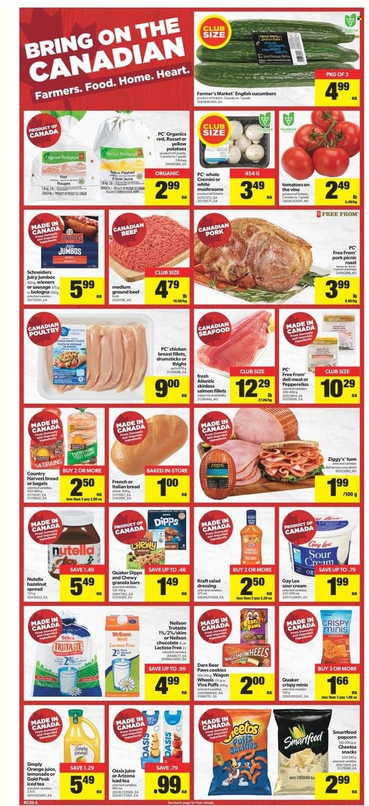thumbnail - Real Canadian Superstore Flyer - December 30, 2021 - January 05, 2022 - Sales products - bagels, puffs, russet potatoes, tomatoes, potatoes, salmon, salmon fillet, Quaker, Kraft®, ham, bologna sausage, sausage, cheddar, sour cream, Country Harvest, cookies, chocolate, snack, Cheetos, Smartfood, popcorn, granola bar, dressing, hazelnut spread, lemonade, orange juice, juice, ice tea, AriZona, beef meat, ground beef, Paws, wagon, Nutella. Page 4.