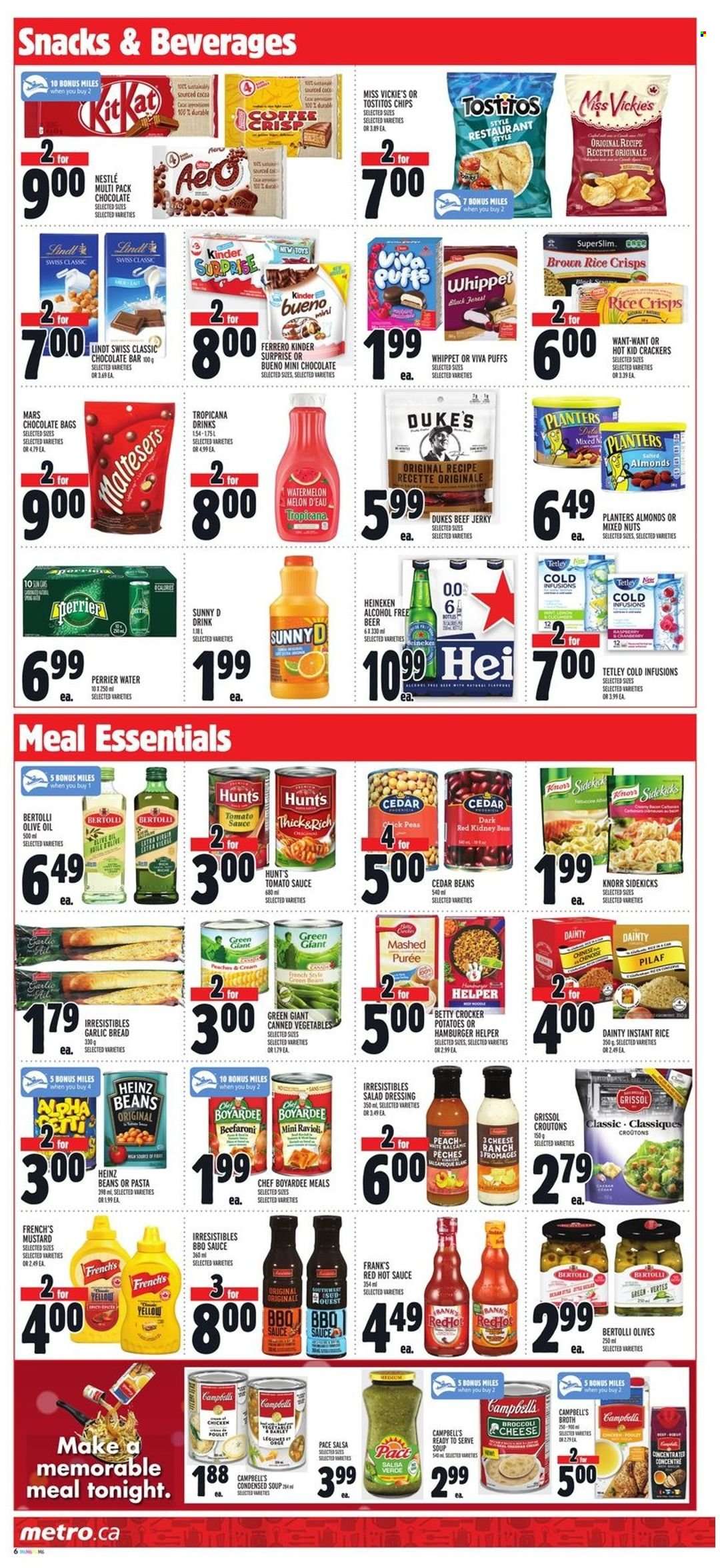 thumbnail - Metro Flyer - January 13, 2022 - January 19, 2022 - Sales products - bread, puffs, beans, potatoes, watermelon, melons, Campbell's, ravioli, condensed soup, soup, sauce, instant soup, Bertolli, beef jerky, jerky, snack, Kinder Surprise, Mars, crackers, Kinder Bueno, chocolate bar, Tostitos, rice crisps, croutons, broth, tomato sauce, canned vegetables, Chef Boyardee, brown rice, rice, BBQ sauce, mustard, salad dressing, hot sauce, dressing, salsa, olive oil, oil, almonds, mixed nuts, Planters, Perrier, beer, Heineken, Knorr, Nestlé, Heinz, olives, chips, Lindt, Ferrero Rocher. Page 8.