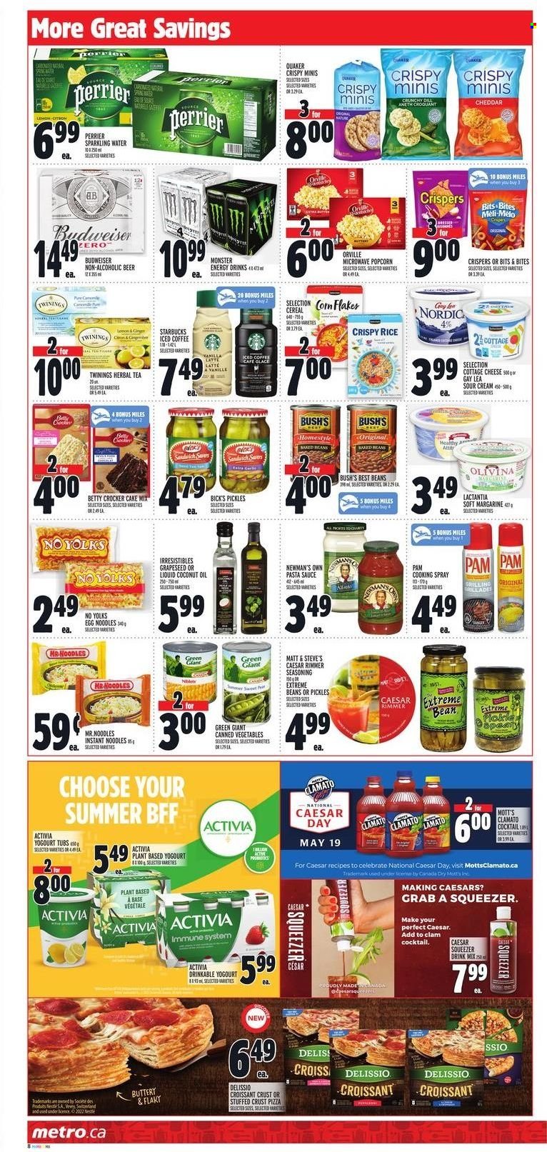 thumbnail - Metro Flyer - May 19, 2022 - May 25, 2022 - Sales products - croissant, cake mix, Mott's, clams, pizza, pasta sauce, sandwich, instant noodles, sauce, Quaker, noodles, cottage cheese, cheddar, Activia, margarine, sour cream, popcorn, pickles, canned vegetables, cereals, corn flakes, egg noodles, dill, spice, coconut oil, cooking spray, oil, energy drink, Monster, Clamato, Monster Energy, Perrier, sparkling water, iced coffee, tea, herbal tea, Twinings, Starbucks, beer, squeezer, Budweiser. Page 9.