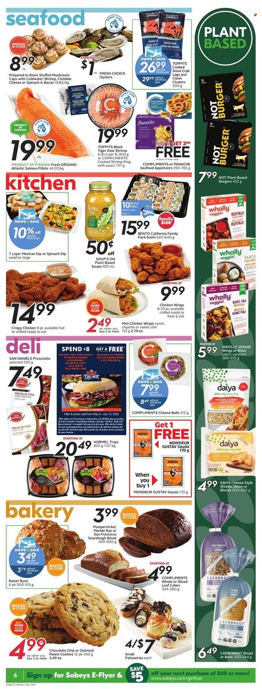 thumbnail - Sobeys Flyer - May 19, 2022 - May 25, 2022 - Sales products - mushrooms, bread, cake, panini, buns, wraps, kale, salmon, salmon fillet, oysters, seafood, crab legs, crab, shrimps, soup, hamburger, Hormel, bacon, prosciutto, gouda, cheddar, dip, spinach dip, chicken wings, cookies, oatmeal. Page 7.