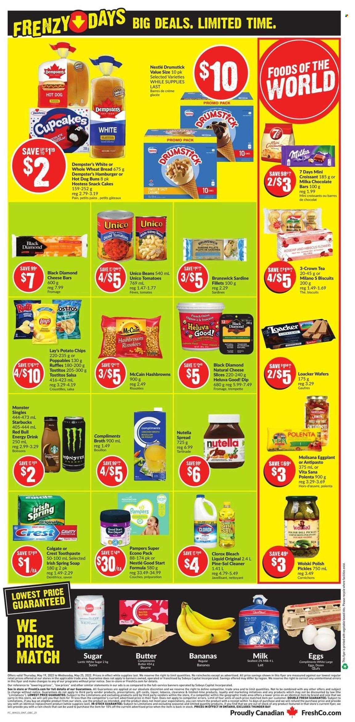 thumbnail - FreshCo. Flyer - May 19, 2022 - May 25, 2022 - Sales products - wheat bread, cake, croissant, buns, cupcake, beans, onion, eggplant, bananas, sardines, sliced cheese, cheese, milk, large eggs, butter, dip, McCain, hash browns, wafers, snack, biscuit, 7 Days, chocolate bar, potato chips, chips, Lay’s, Ruffles, Tostitos, bouillon, sugar, chicken broth, broth, pickles, polenta, dill, salsa, energy drink, Monster, Red Bull, tea, Starbucks, Colgate, Nestlé, Nutella. Page 4.