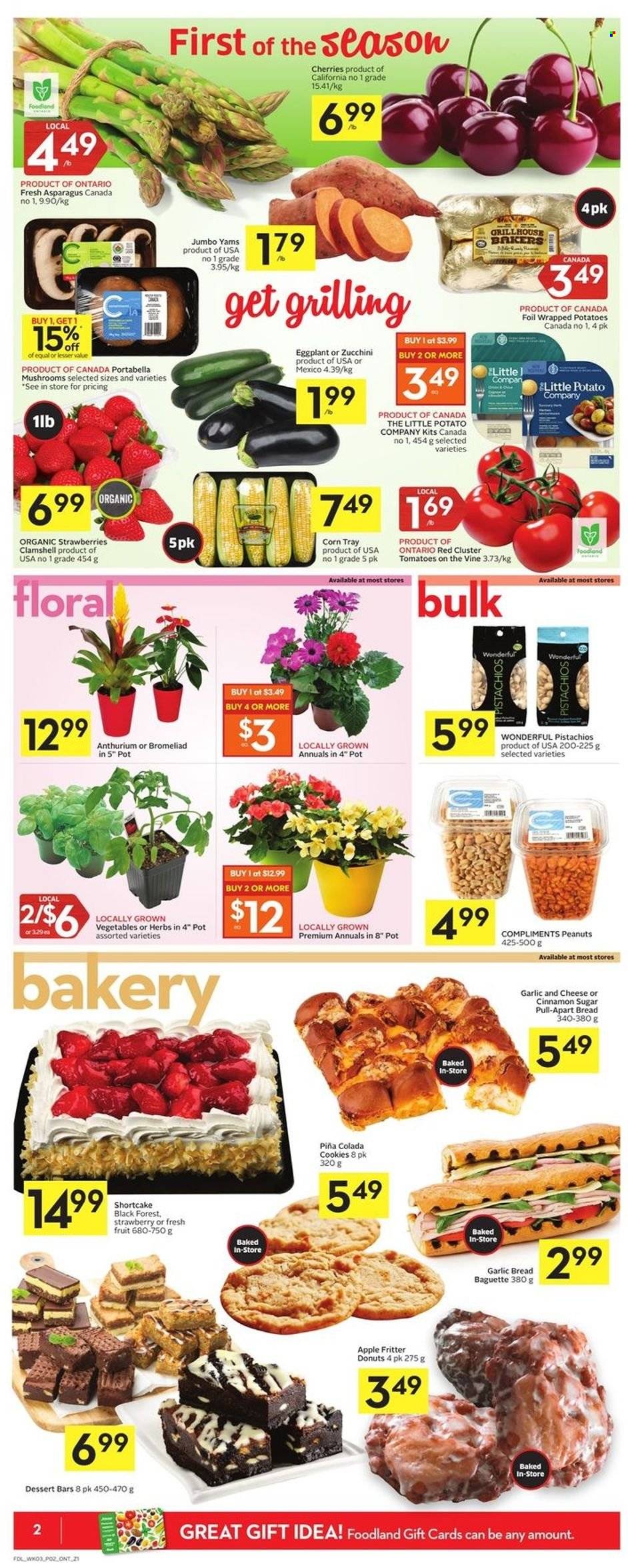thumbnail - Foodland Flyer - May 19, 2022 - May 25, 2022 - Sales products - mushrooms, bread, donut, asparagus, corn, tomatoes, zucchini, potatoes, eggplant, strawberries, cookies, sugar, cinnamon, peanuts, pistachios, baguette. Page 2.