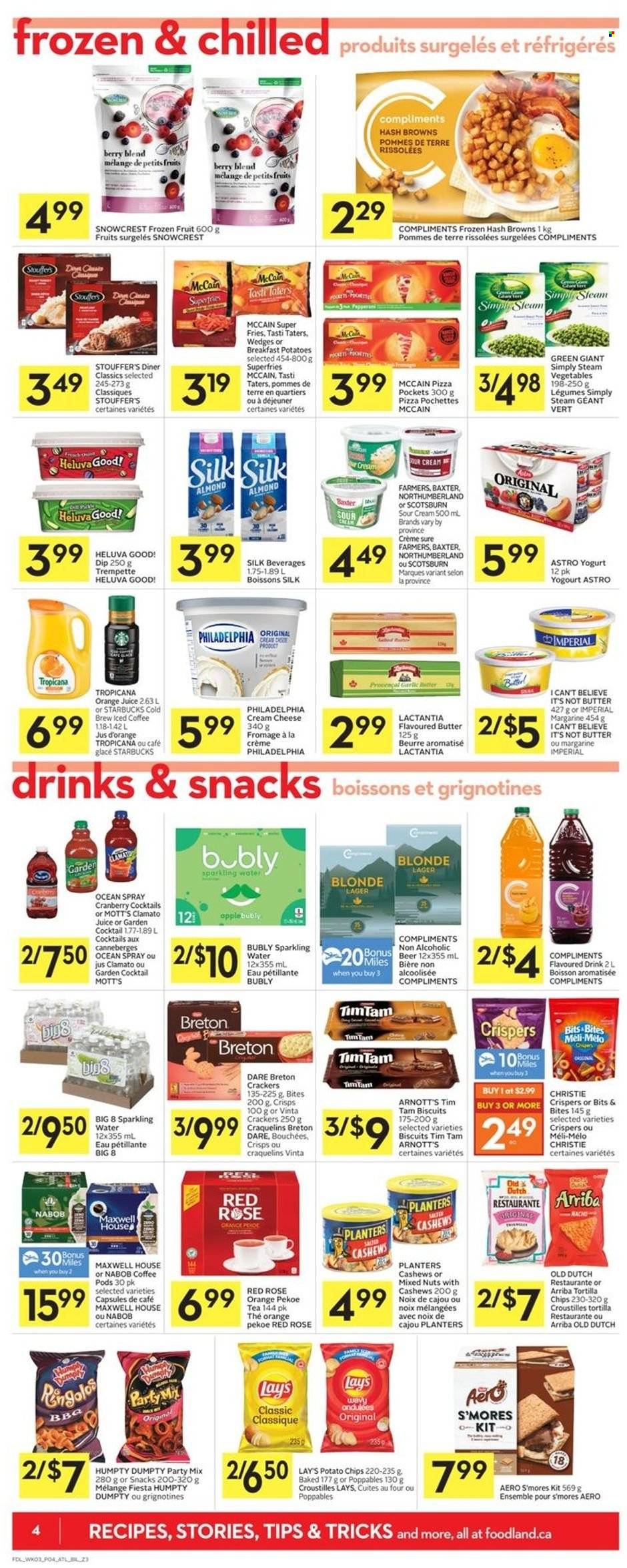 thumbnail - Co-op Flyer - May 19, 2022 - May 25, 2022 - Sales products - garlic, Mott's, pizza, cream cheese, yoghurt, butter, margarine, I Can't Believe It's Not Butter, sour cream, dip, Stouffer's, McCain, hash browns, potato fries, crackers, Tim Tam, biscuit, tortilla chips, potato chips, Lay’s, cashews, mixed nuts, Planters, orange juice, juice, Clamato, sparkling water, iced coffee, Maxwell House, tea, coffee pods, Starbucks, wine, rosé wine, beer, Lager, Philadelphia. Page 4.
