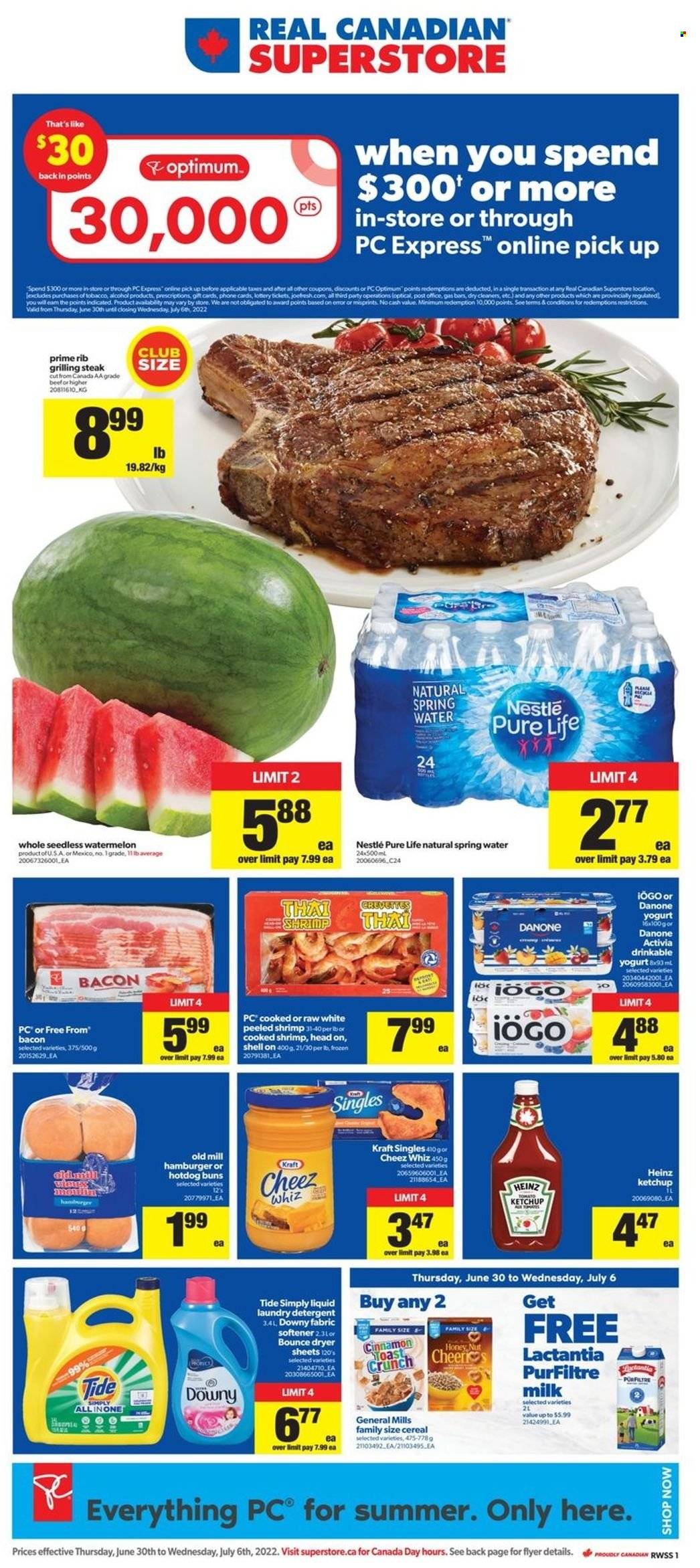 thumbnail - Real Canadian Superstore Flyer - June 30, 2022 - July 06, 2022 - Sales products - hot dog rolls, buns, watermelon, hamburger, Kraft®, bacon, sandwich slices, Kraft Singles, yoghurt, Activia, milk, cereals, cinnamon, spring water, alcohol, Tide, fabric softener, laundry detergent, Bounce, dryer sheets, Downy Laundry, Optimum, detergent, Nestlé, Heinz, ketchup, steak, Danone. Page 1.