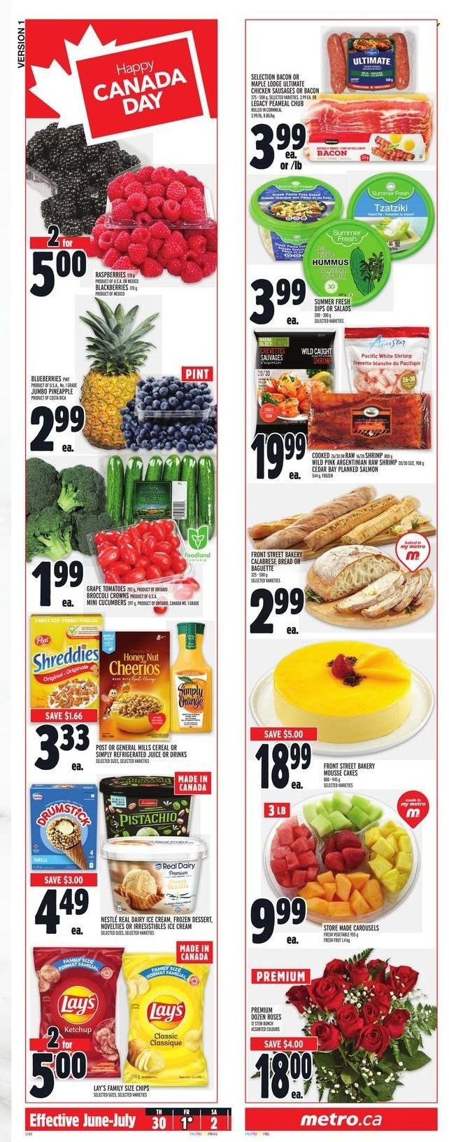 thumbnail - Metro Flyer - June 30, 2022 - July 06, 2022 - Sales products - bread, cake, cucumber, tomatoes, blackberries, blueberries, pineapple, salmon, shrimps, pasta, bacon, sausage, tzatziki, hummus, ice cream, Lay’s, cereals, Cheerios, juice, rose, baguette, Nestlé, ketchup. Page 14.