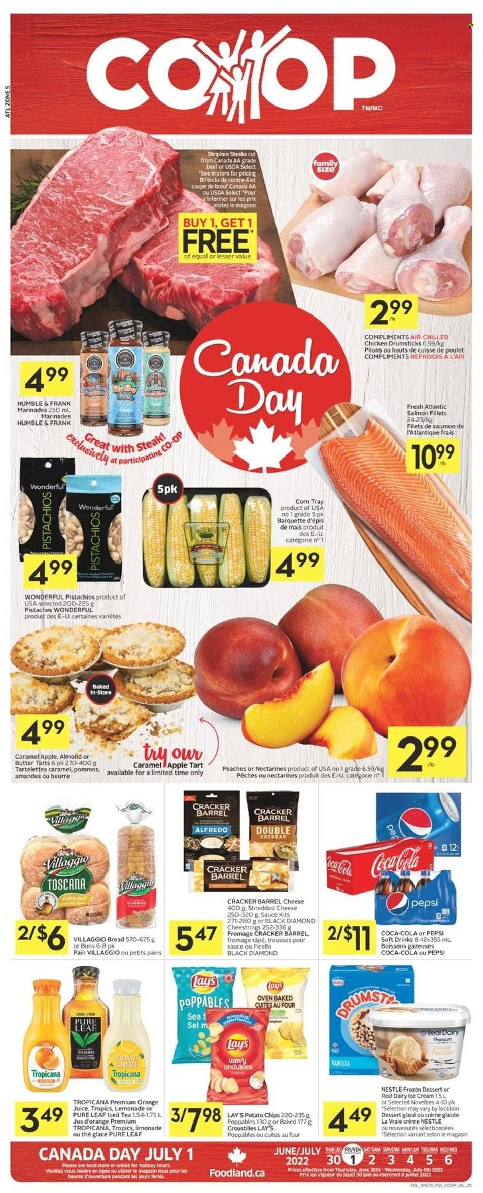 thumbnail - Co-op Flyer - June 30, 2022 - July 06, 2022 - Sales products - bread, tart, buns, corn, nectarines, peaches, salmon, salmon fillet, sauce, shredded cheese, string cheese, butter, ice cream, crackers, potato chips, Lay’s, Classico, pistachios, Coca-Cola, lemonade, Pepsi, orange juice, juice, ice tea, soft drink, Pure Leaf, chicken drumsticks, chicken, beef meat, striploin steak, Nestlé, steak. Page 1.