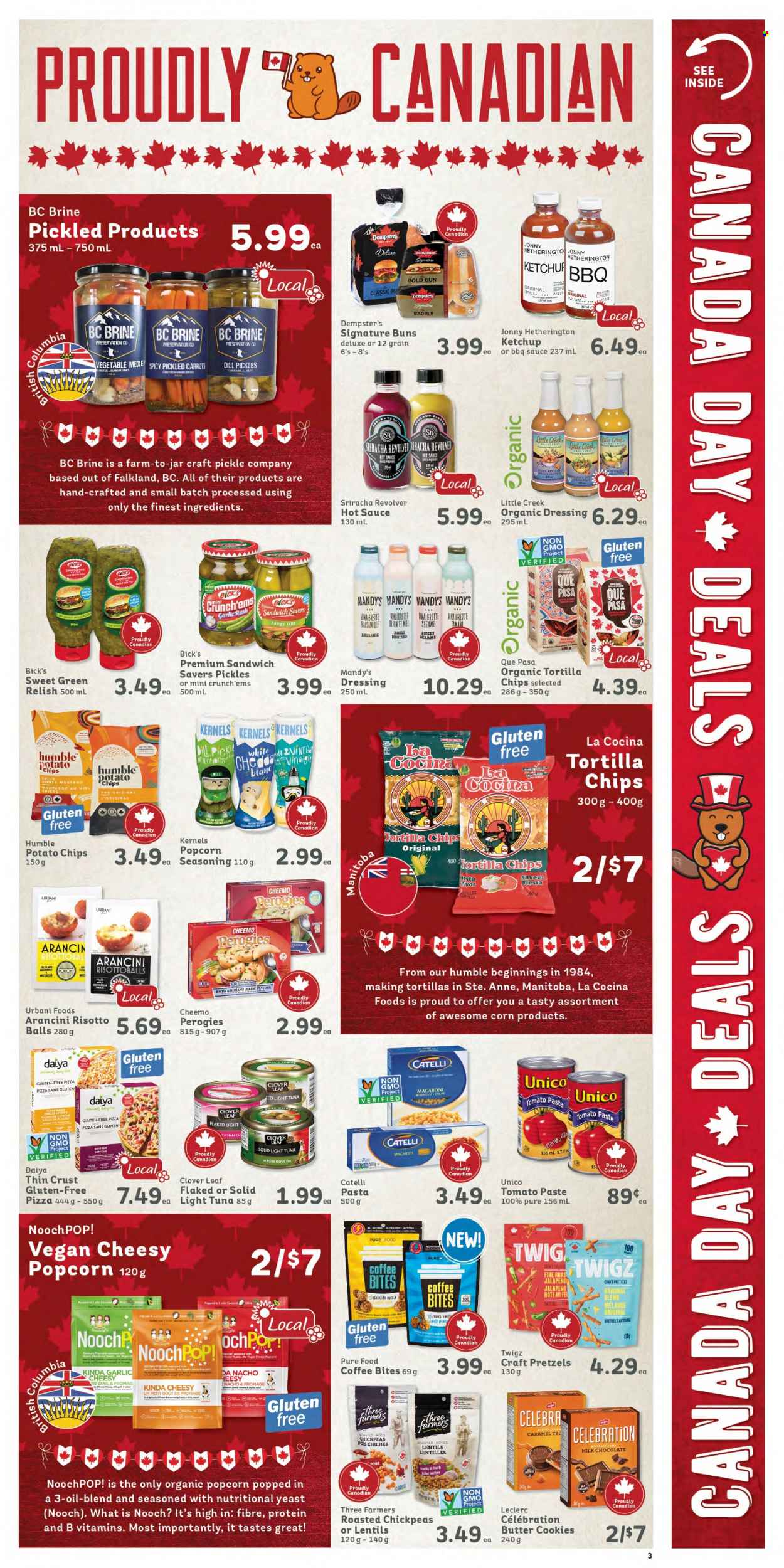 thumbnail - IGA Simple Goodness Flyer - July 01, 2022 - July 07, 2022 - Sales products - pretzels, buns, corn, garlic, ginger, jalapeño, avocado, coconut, tuna, spaghetti, pizza, sandwich, macaroni, pasta, bacon, Clover, cookies, milk chocolate, chocolate, butter cookies, snack, Celebration, tortilla chips, potato chips, chips, popcorn, lentils, tomato paste, pickles, light tuna, chickpeas, dill, spice, BBQ sauce, caramel, mustard, sriracha, vinaigrette dressing, honey mustard, hot sauce, dressing, olive oil, oil, coffee, granola, ketchup. Page 3.