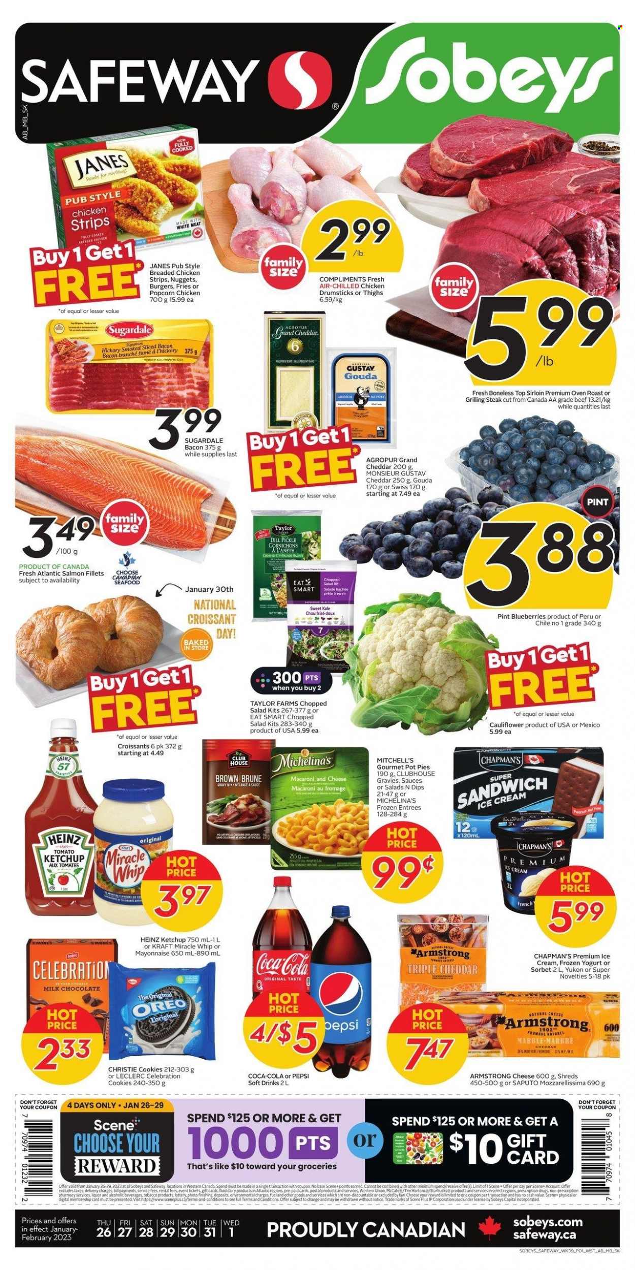 thumbnail - Sobeys Flyer - January 26, 2023 - February 01, 2023 - Sales products - croissant, pot pie, cauliflower, kale, salad, chopped salad, salmon, salmon fillet, seafood, macaroni & cheese, sandwich, nuggets, hamburger, fried chicken, Kraft®, Sugardale, bacon, gouda, cheddar, yoghurt, mayonnaise, Miracle Whip, ice cream, strips, chicken strips, potato fries, cookies, milk chocolate, Celebration, dill pickle, popcorn, dill, gravy mix, Coca-Cola, Pepsi, soft drink, hot chocolate, Starbucks, McCafe, liquor, chicken drumsticks, chicken, Heinz, ketchup, Oreo, steak. Page 1.