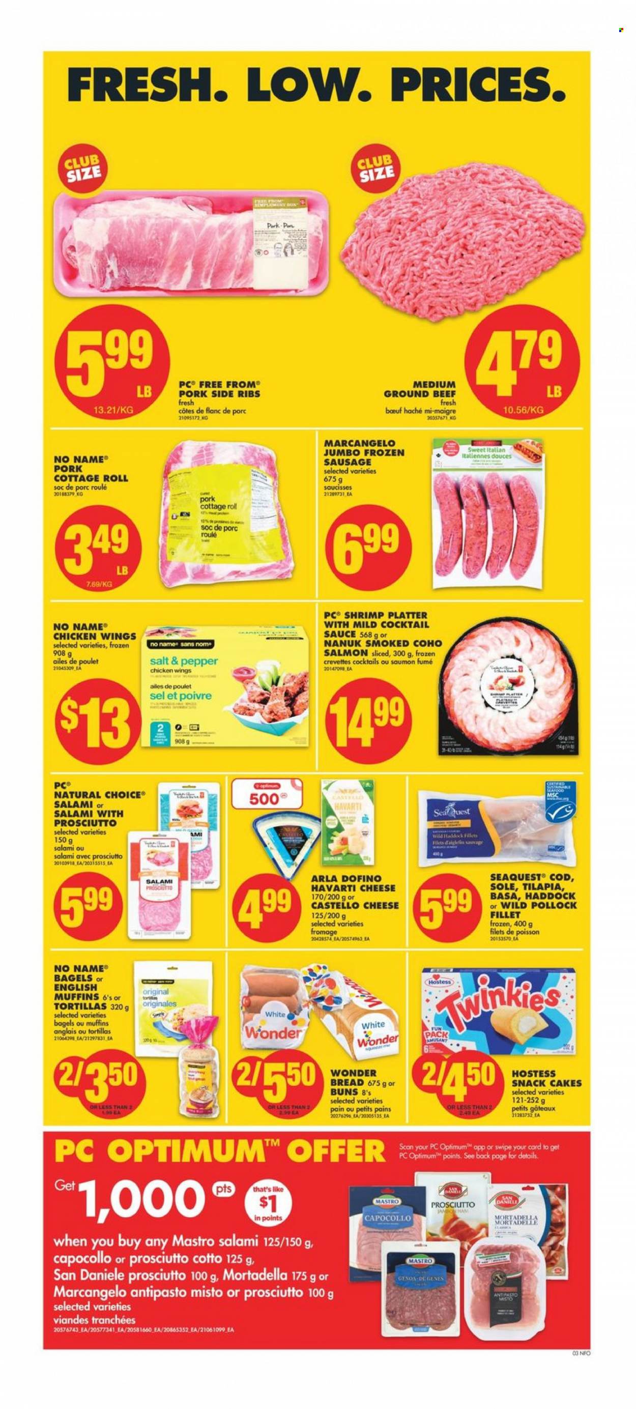 thumbnail - No Frills Flyer - January 26, 2023 - February 01, 2023 - Sales products - bagels, bread, english muffins, tortillas, cake, buns, cod, salmon, tilapia, haddock, pollock, shrimps, No Name, sauce, mortadella, salami, ham, sausage, Havarti, cheese, Arla, chicken wings, snack, cocktail sauce, beef meat, ground beef, ribs, Optimum. Page 3.