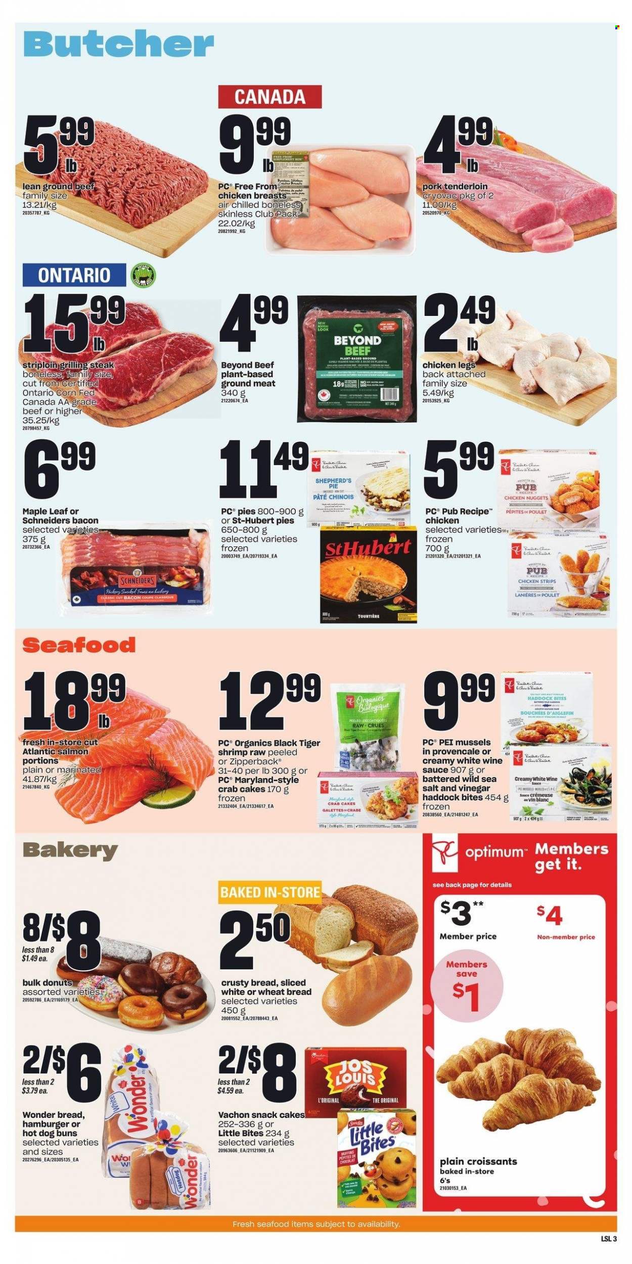 thumbnail - Loblaws Flyer - January 26, 2023 - February 01, 2023 - Sales products - wheat bread, pie, croissant, buns, donut, muffin, mussels, salmon, haddock, seafood, shrimps, crab cake, nuggets, sauce, chicken nuggets, bacon, strips, chicken strips, snack, Little Bites, sea salt, vinegar, white wine, chicken breasts, chicken legs, chicken, beef meat, ground beef, pork meat, pork tenderloin, Optimum, steak. Page 4.