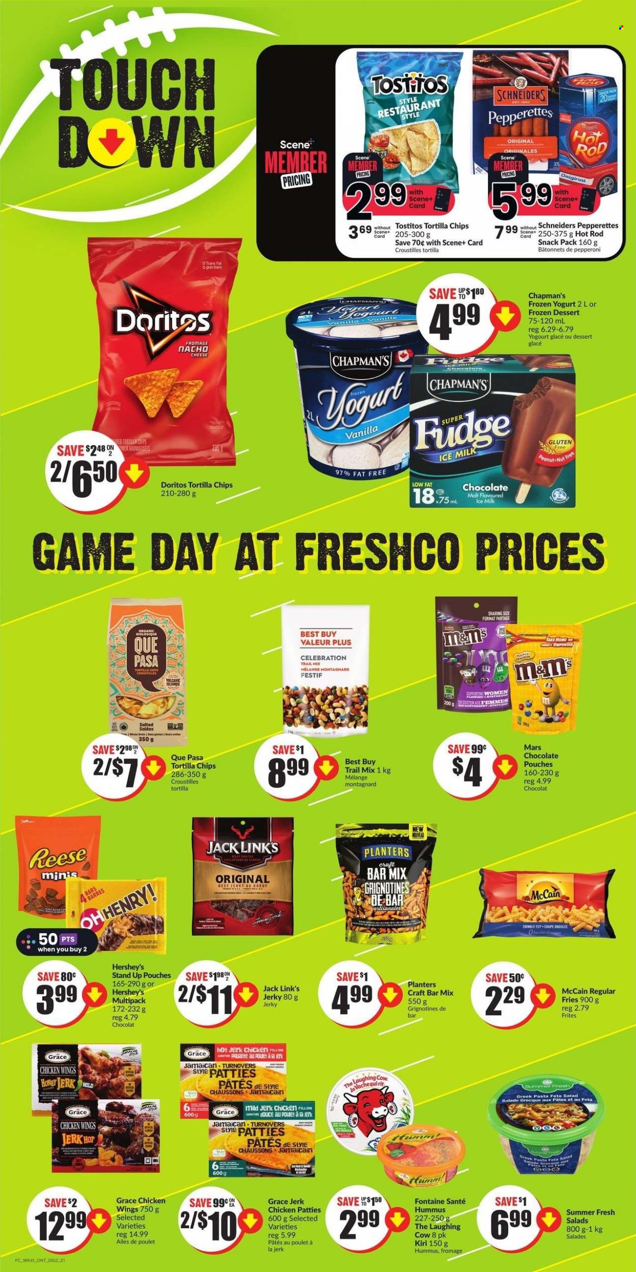 thumbnail - FreshCo. Flyer - February 09, 2023 - February 15, 2023 - Sales products - turnovers, salad, pasta, jerky, pepperoni, hummus, Kiri, The Laughing Cow, feta, yoghurt, milk, Hershey's, chicken wings, chicken patties, McCain, potato fries, crinkle fries, Mars, Celebration, Doritos, tortilla chips, Tostitos, Jack Link's, honey, Planters, trail mix, M&M's. Page 11.