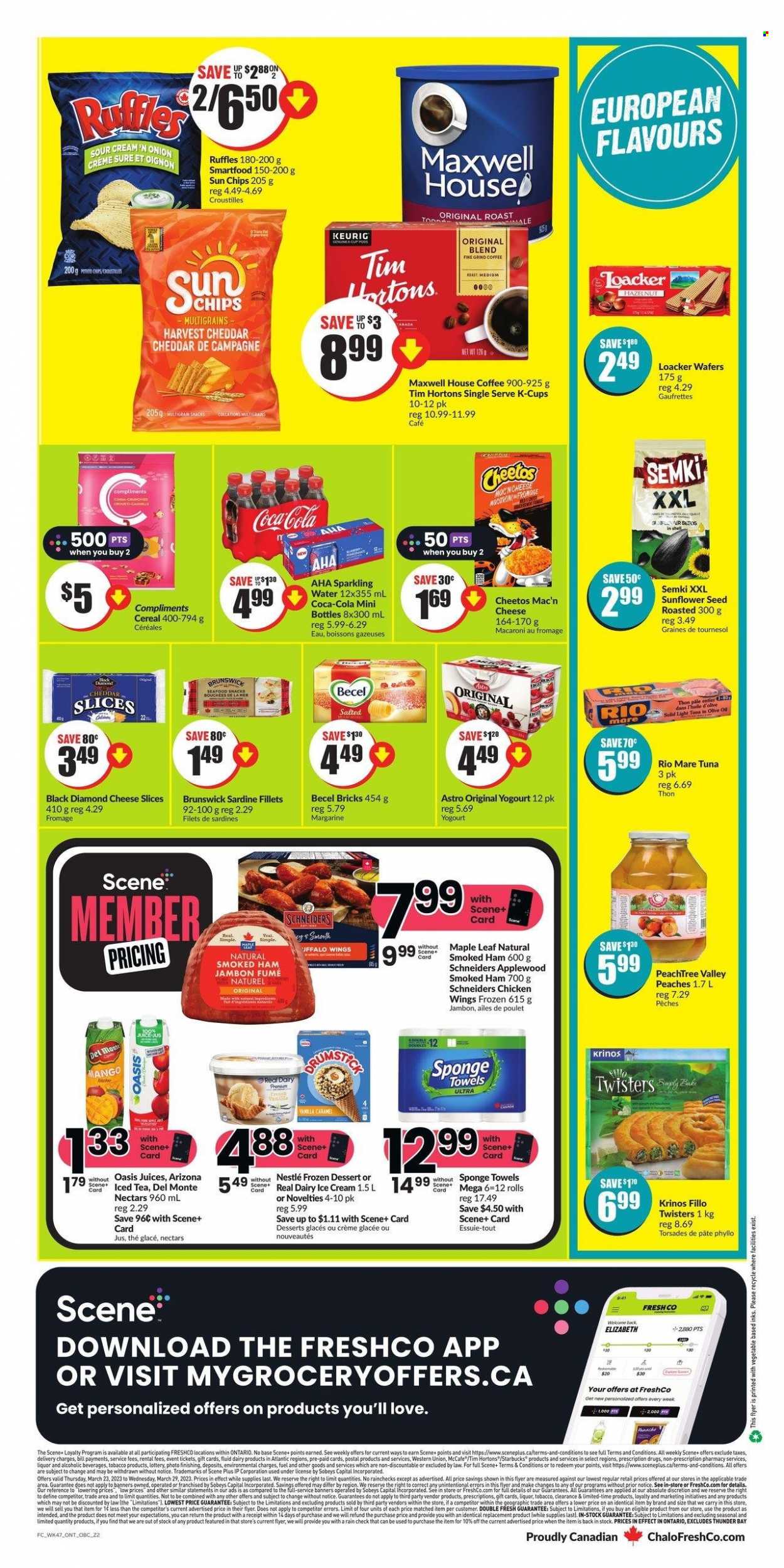 thumbnail - Chalo! FreshCo. Flyer - March 23, 2023 - March 29, 2023 - Sales products - onion, mango, peaches, sardines, tuna, seafood, macaroni, roast, ham, smoked ham, sliced cheese, cheese, margarine, sour cream, ice cream, chicken wings, wafers, snack, Cheetos, Smartfood, Ruffles, light tuna, Del Monte, cereals, caramel, Coca-Cola, juice, ice tea, AriZona, sparkling water, water, Maxwell House, coffee, coffee capsules, Starbucks, K-Cups, Keurig, chicken, Absolute, Sure, sponge, plant seeds, Nestlé. Page 6.