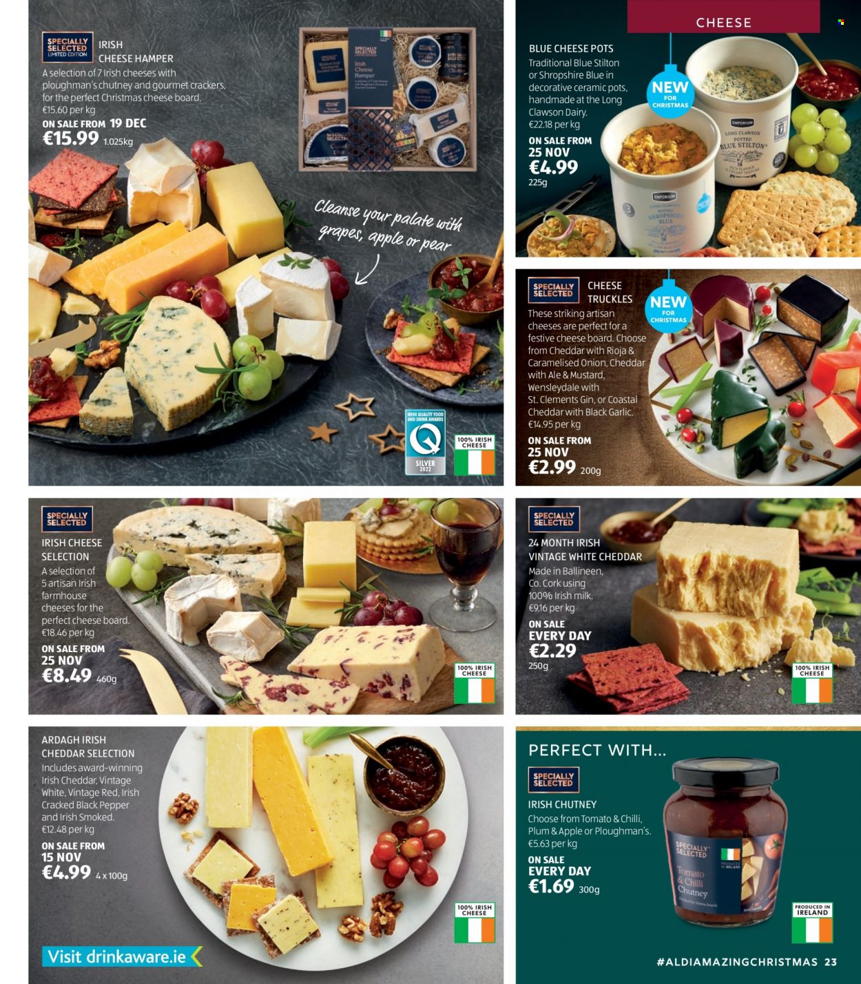 thumbnail - Aldi offer  - Sales products - garlic, grapes, pears, hamper, blue cheese, Stilton, Wensleydale, milk, crackers, black pepper, mustard, chutney, gin, pot, cheese board. Page 23.