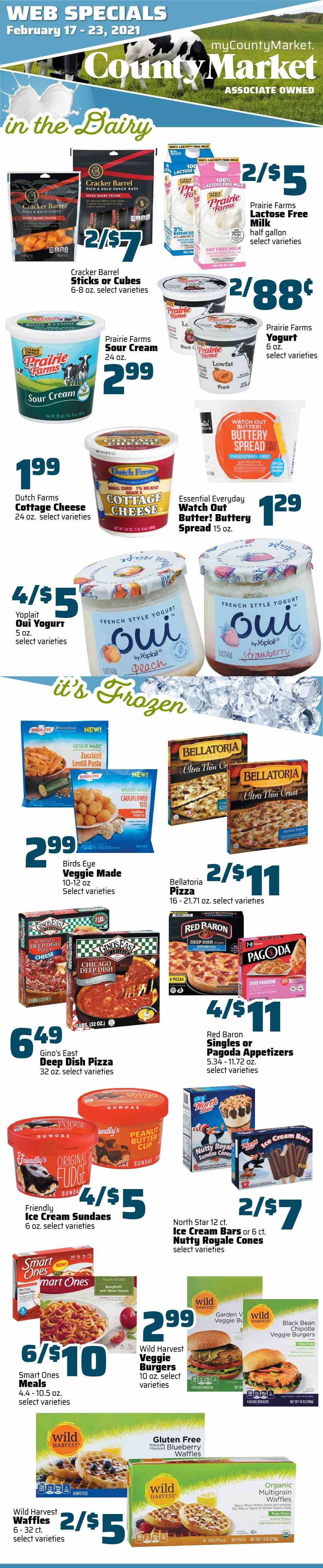 thumbnail - County Market Flyer - 02/17/2021 - 02/23/2021 - Sales products - zucchini, waffles, crab, pizza, hamburger, sauce, Bird's Eye, veggie burger, sausage, pepperoni, cottage cheese, cheese, Yoplait, yoghurt, lactose free milk, milk, buttery spread, sour cream, ice cream, ice cream bars, cauliflower, beans, corn, Red Baron, Bellatoria, crackers, peanut butter cups, Wild Harvest, fudge, snack bar, snack, pasta, spaghetti, corn syrup, syrup, peanut butter, Sol. Page 1.