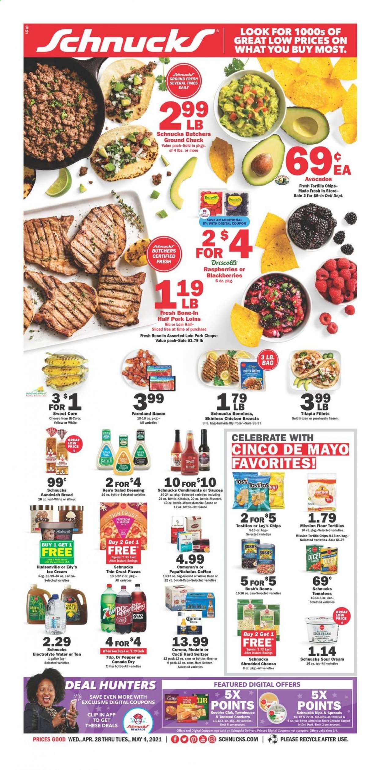 thumbnail - Schnucks Flyer - 04/28/2021 - 05/04/2021 - Sales products - bread, flour tortillas, corn, tomatoes, sweet corn, avocado, blackberries, raspberries, tilapia, pizza, bacon, shredded cheese, sour cream, ice cream, crackers, Keebler, tortilla chips, Lay’s, Tostitos, mustard, salad dressing, worcestershire sauce, hot sauce, ketchup, dressing, Canada Dry, Dr. Pepper, 7UP, tea, coffee, coffee capsules, K-Cups, Hard Seltzer, beer, Corona Extra, Modelo, chicken breasts, ground chuck, pork chops, pork meat. Page 1.