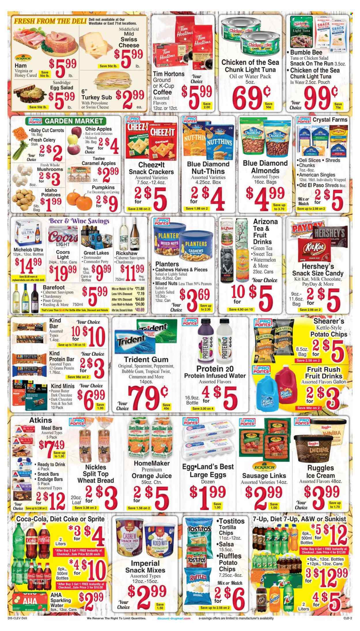 thumbnail - Discount Drug Mart Flyer - 09/15/2021 - 09/21/2021 - Sales products - mushrooms, wheat bread, Old El Paso, carrots, celery, pumpkin, salad, apples, watermelon, tuna, Bumble Bee, ham, sausage, chicken salad, swiss cheese, cheese, Provolone, large eggs, Hershey's, milk chocolate, snack, KitKat, bubblegum, crackers, dark chocolate, Trident, snack bar, Shearer’s, tortilla chips, potato chips, chips, Thins, Ruffles, Tostitos, tuna in water, light tuna, Chicken of the Sea, protein bar, cinnamon, caramel, salsa, honey, peanut butter, almonds, cashews, peanuts, pistachios, mixed nuts, Planters, Blue Diamond, Coca-Cola, Sprite, orange juice, juice, Diet Coke, 7UP, AriZona, A&W, sparkling water, green tea, coffee, coffee capsules, K-Cups, Cabernet Sauvignon, red wine, Riesling, white wine, Chardonnay, wine, Pinot Grigio, sake, beer, pan, Coors, Michelob. Page 2.