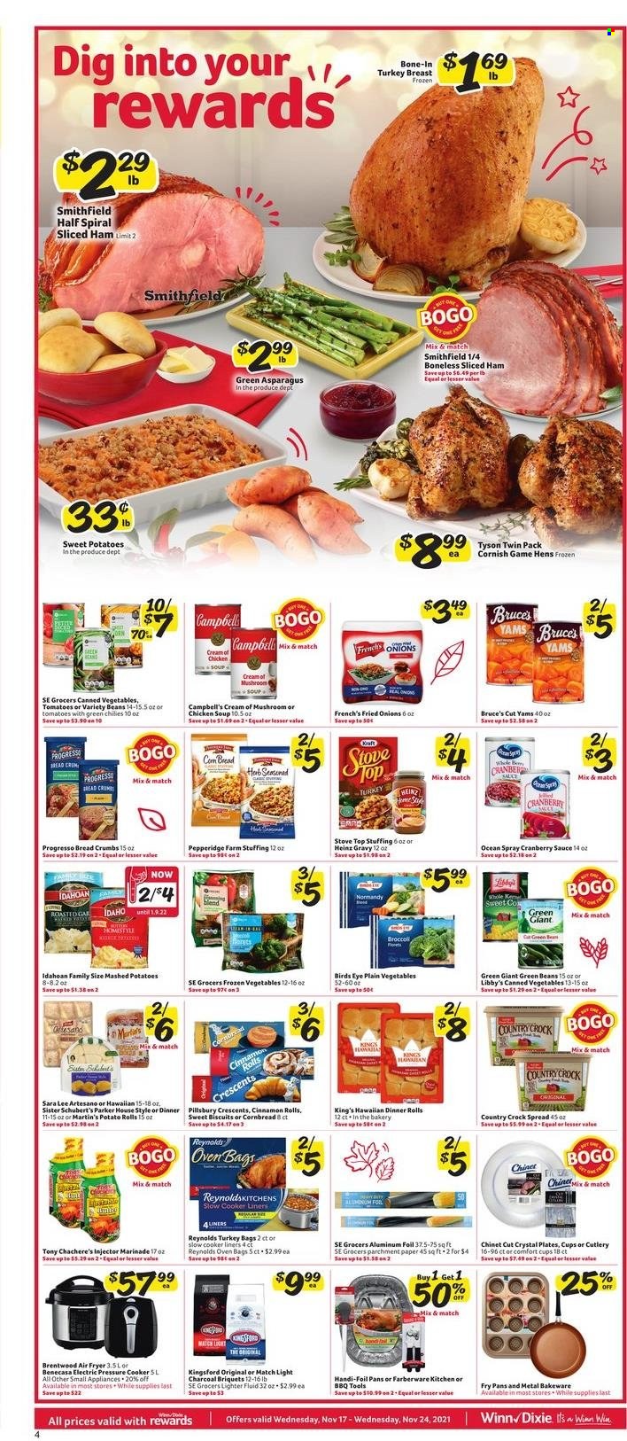 thumbnail - Winn Dixie Flyer - 11/17/2021 - 11/24/2021 - Sales products - dinner rolls, corn bread, potato rolls, Sara Lee, cinnamon roll, breadcrumbs, asparagus, beans, broccoli, green beans, sweet potato, tomatoes, Campbell's, mashed potatoes, chicken soup, soup, sauce, Bird's Eye, Progresso, ham, frozen vegetables, Mars, biscuit, Heinz, canned vegetables, marinade, cranberry sauce, turkey breast, plate, pressure cooker, cup, bakeware, aluminium foil, pen, paper, Parker. Page 4.