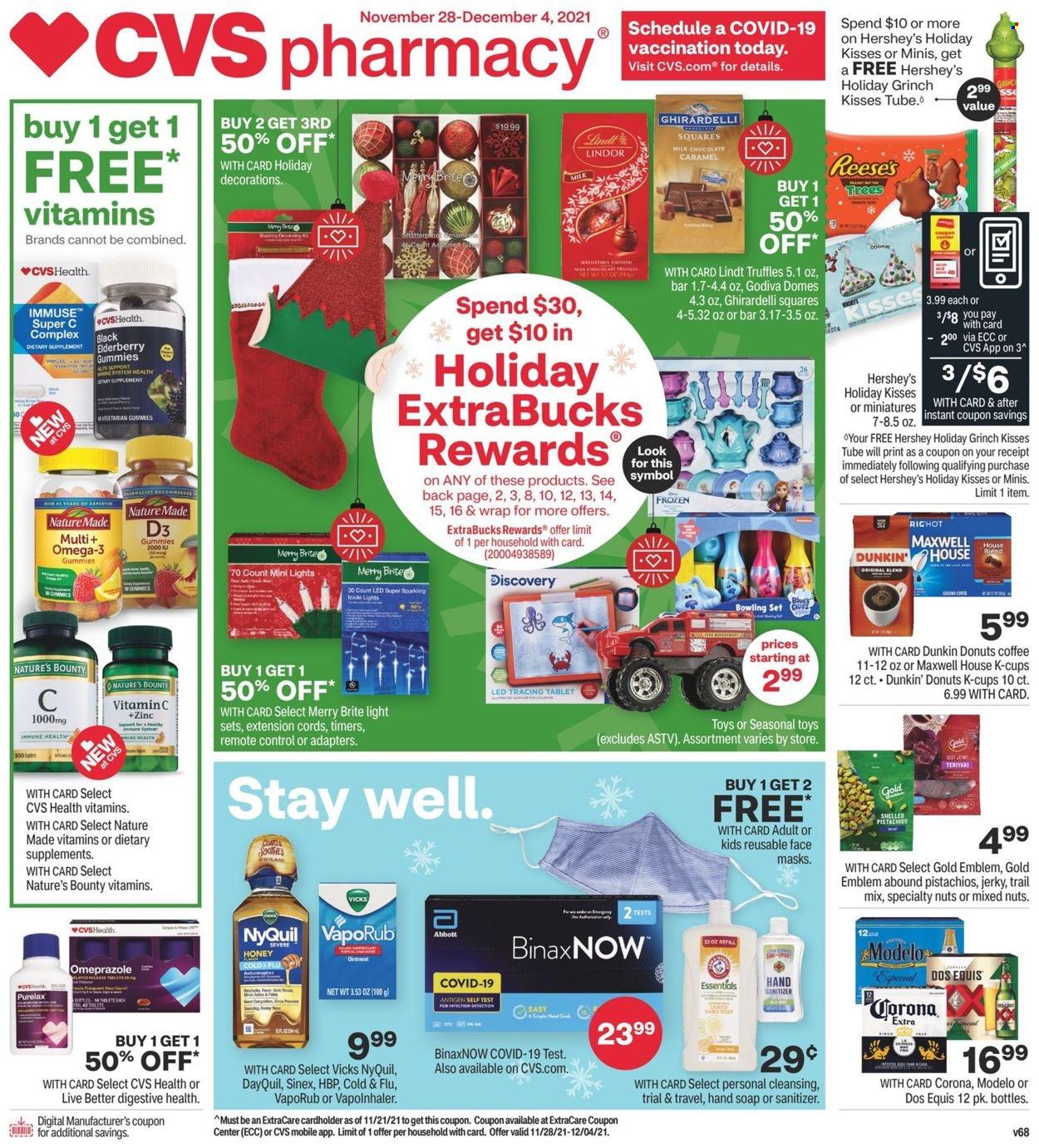 thumbnail - CVS Pharmacy Flyer - 11/28/2021 - 12/04/2021 - Sales products - jerky, Reese's, Hershey's, milk chocolate, chocolate, Lindt, Lindor, truffles, Godiva, Ghirardelli, pistachios, mixed nuts, trail mix, Maxwell House, coffee, coffee capsules, K-Cups, Dunkin' Donuts, hand soap, soap, Purelax, face mask, Brite, Vicks, Select Gold, toys, DayQuil, Cold & Flu, Nature Made, Nature's Bounty, vitamin c, NyQuil, Omega-3, zinc, VapoRub, vitamin D3, Sinex, dietary supplement, beer, Corona Extra, Modelo, Dos Equis. Page 1.