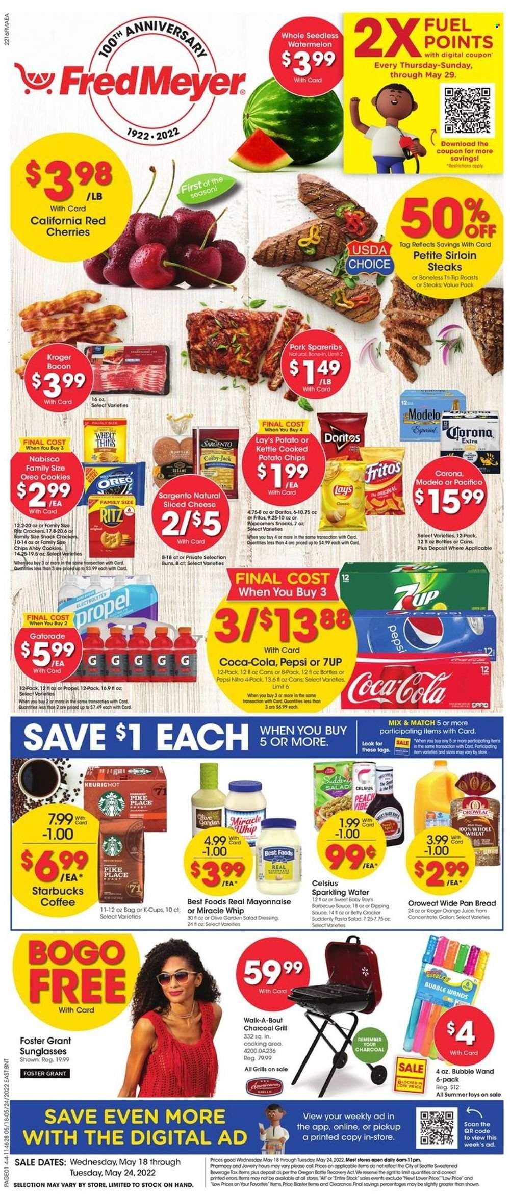 thumbnail - Fred Meyer Flyer - 05/18/2022 - 05/24/2022 - Sales products - bread, buns, watermelon, cherries, pasta, bacon, pasta salad, Colby cheese, sliced cheese, Sargento, Oreo, mayonnaise, Miracle Whip, cookies, snack, crackers, RITZ, Doritos, Fritos, potato chips, chips, Lay’s, Thins, popcorn, dressing, Coca-Cola, Pepsi, orange juice, juice, 7UP, Gatorade, sparkling water, coffee, Starbucks, coffee capsules, K-Cups, beer, Corona Extra, Modelo, steak, sirloin steak, pork spare ribs, pan, sunglasses, toys. Page 1.
