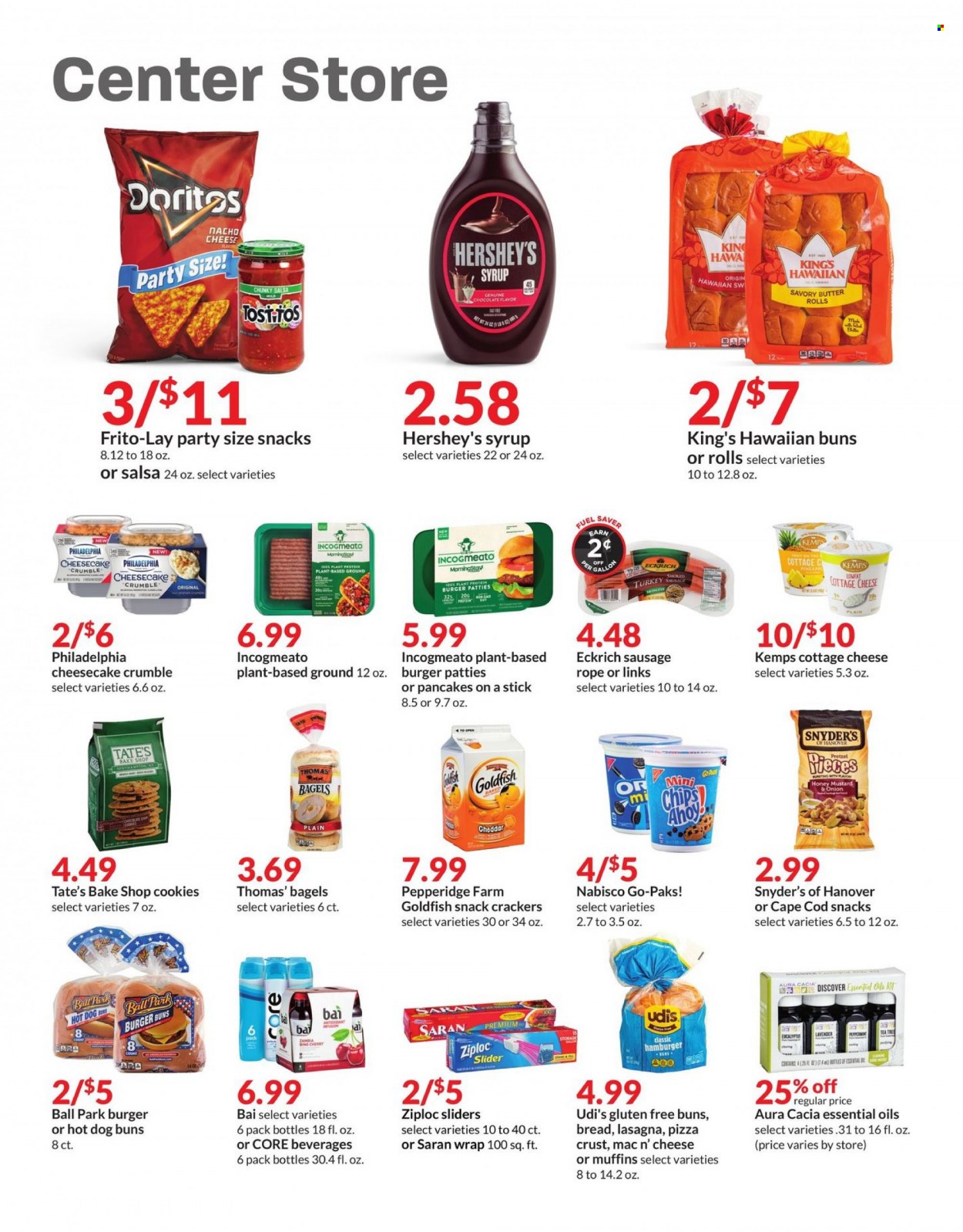 thumbnail - Hy-Vee Flyer - 05/25/2022 - 05/31/2022 - Sales products - bagels, pretzels, tart, buns, burger buns, cherries, cod, pizza, lasagna meal, sausage, smoked sausage, cottage cheese, Philadelphia, Kemps, butter, Hershey's, cookies, chocolate, snack, crackers, Chips Ahoy!, Doritos, chips, Goldfish, Frito-Lay, plant protein, mustard, honey mustard, salsa, syrup, Bai, tea, burger patties, Ziploc, gallon, essential oils, tea tree. Page 15.