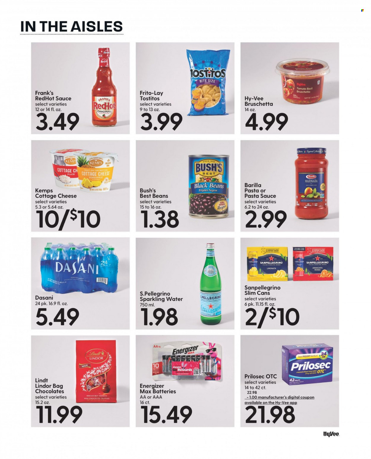 thumbnail - Hy-Vee Flyer - 09/01/2022 - 09/30/2022 - Sales products - beans, pineapple, pasta sauce, sauce, Barilla, bruschetta, cottage cheese, cheese, Kemps, milk chocolate, chocolate, Lindt, Lindor, truffles, Frito-Lay, Tostitos, black beans, sparkling water, purified water, San Pellegrino, bag, battery, Energizer, lemons. Page 70.