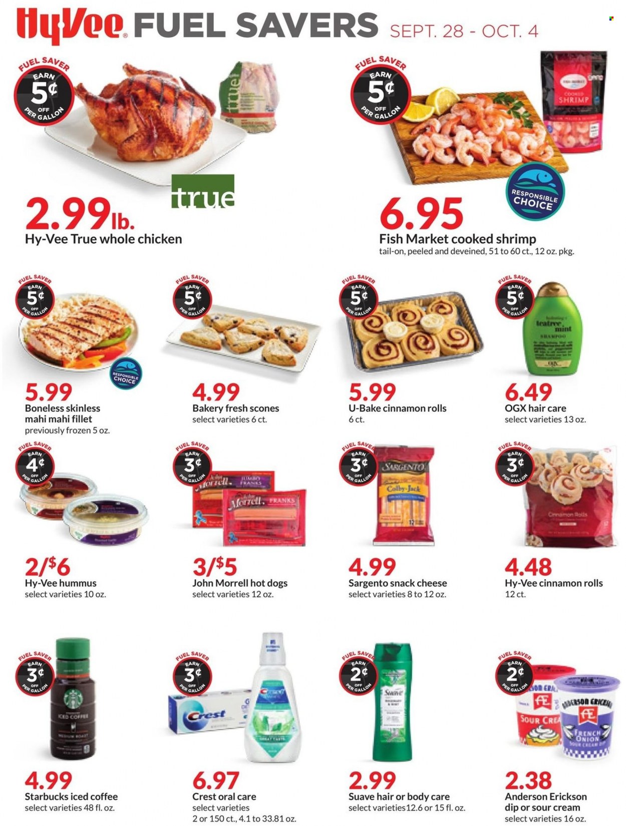 thumbnail - Hy-Vee Flyer - 09/28/2022 - 10/04/2022 - Sales products - cinnamon roll, onion, mahi mahi, shrimps, hot dog, hummus, Colby cheese, cheese, Sargento, sour cream, dip, snack, iced coffee, Starbucks, whole chicken, Suave, Crest, OGX, gallon. Page 10.