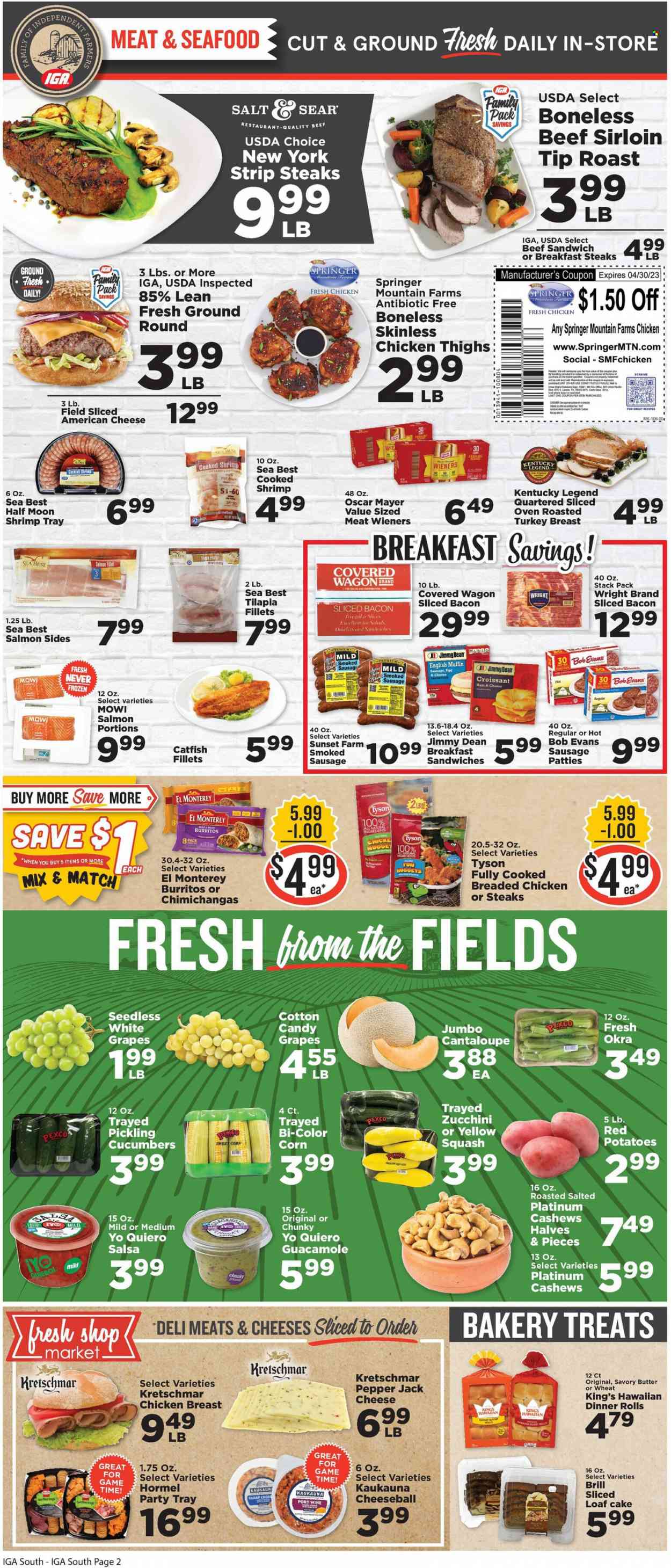 thumbnail - IGA Flyer - 03/22/2023 - 03/28/2023 - Sales products - english muffins, cake, dinner rolls, muffin, loaf cake, cantaloupe, corn, cucumber, zucchini, potatoes, okra, sweet corn, red potatoes, yellow squash, grapes, catfish, tilapia, seafood, shrimps, sandwich, fried chicken, burrito, Bob Evans, Jimmy Dean, Hormel, roast, bacon, Oscar Mayer, sausage, smoked sausage, guacamole, american cheese, Pepper Jack cheese, cheese, cotton candy, salsa, cashews, port wine, chicken breasts, chicken thighs, chicken, beef meat, beef sirloin, steak, striploin steak. Page 2.