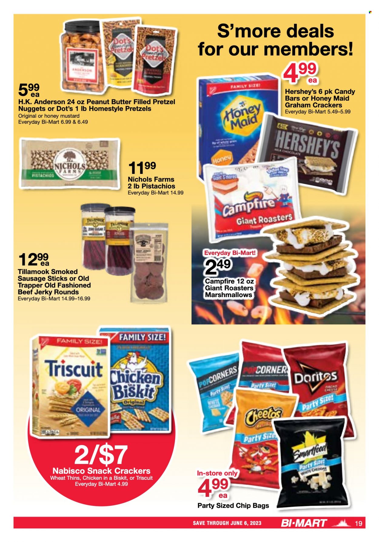 thumbnail - Bi-Mart Flyer - 05/23/2023 - 06/06/2023 - Sales products - pretzels, nuggets, beef jerky, jerky, snack, sausage, smoked sausage, cheese, Hershey's, graham crackers, marshmallows, crackers, candy bar, Nabisco, Doritos, Cheetos, Thins, popcorn, salty snack, Honey Maid, mustard, honey mustard, peanut butter, pistachios, chicken, Campfire. Page 18.